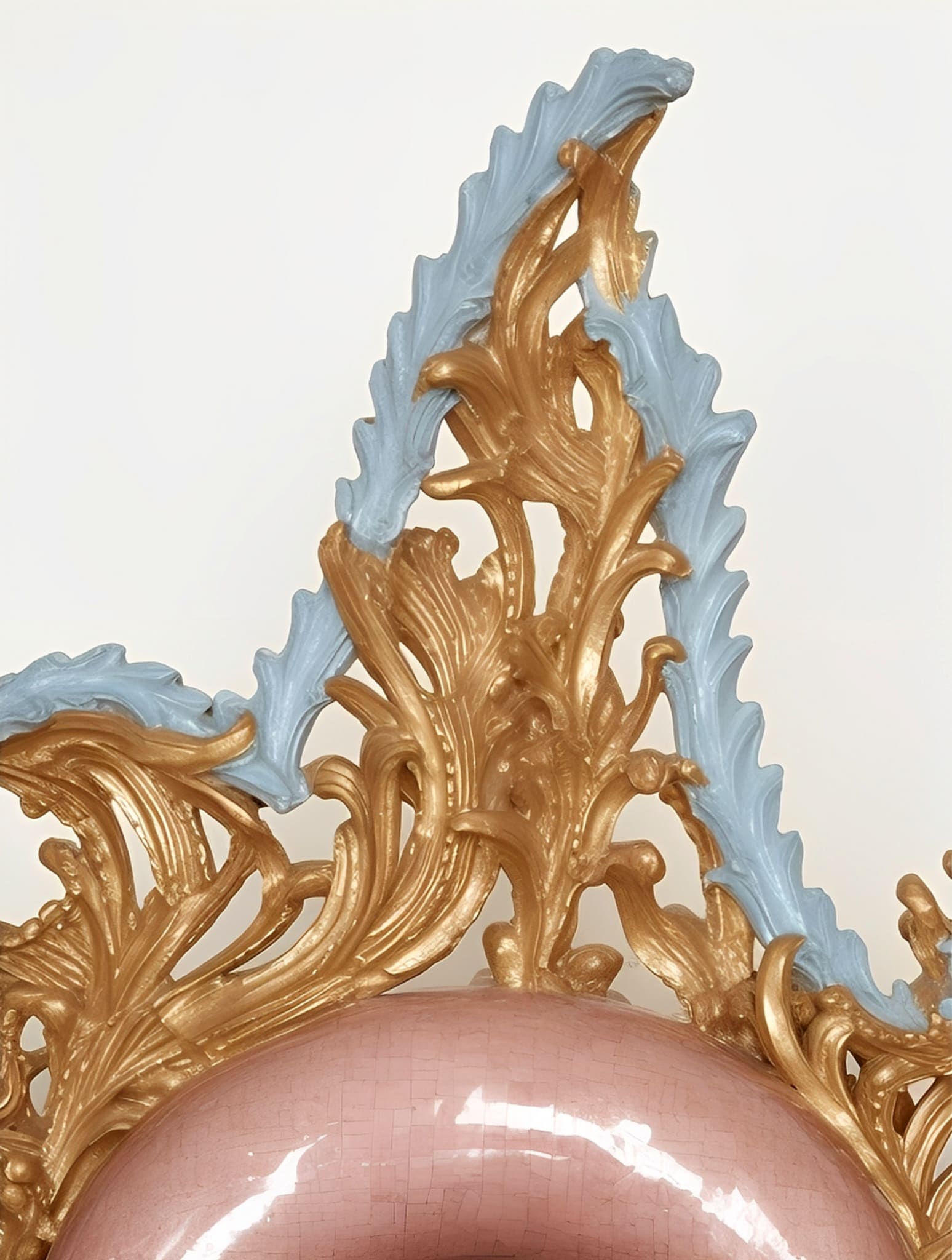 The image depicts a close-up detail of an ornate rococo object or sculpture.