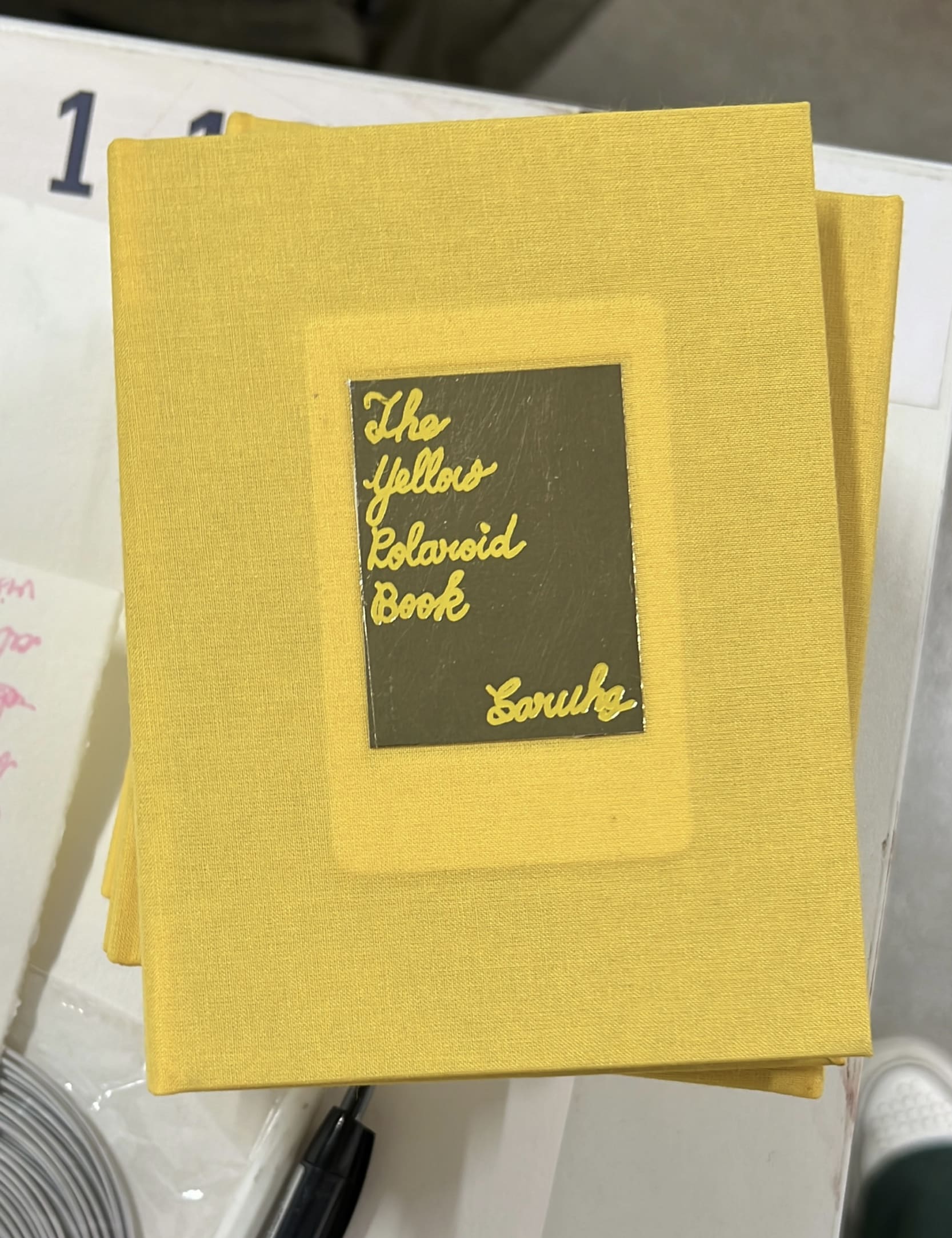 The yellow polaroid book, polaroid images, epoxy, book