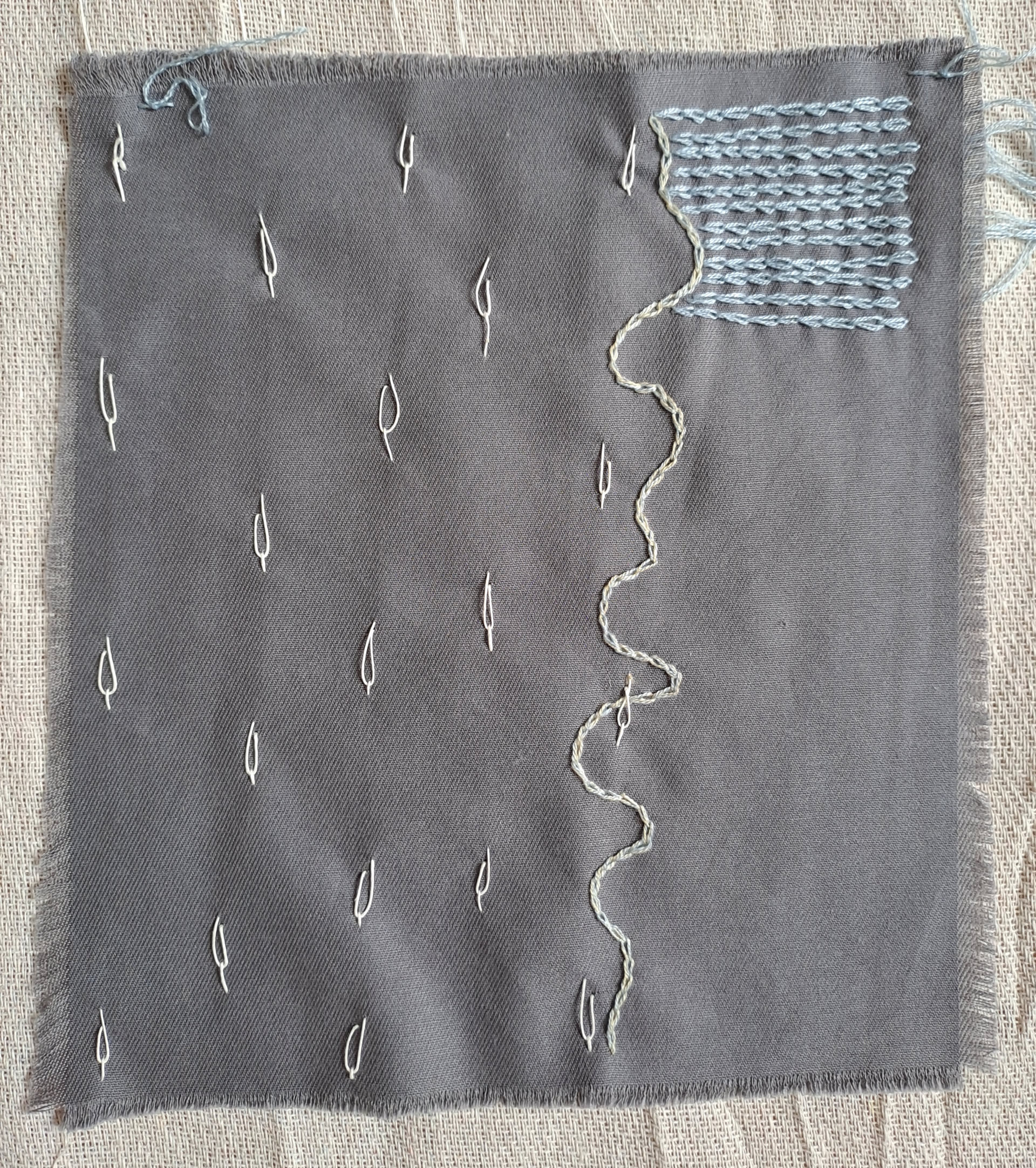 Image of paper with embroidery