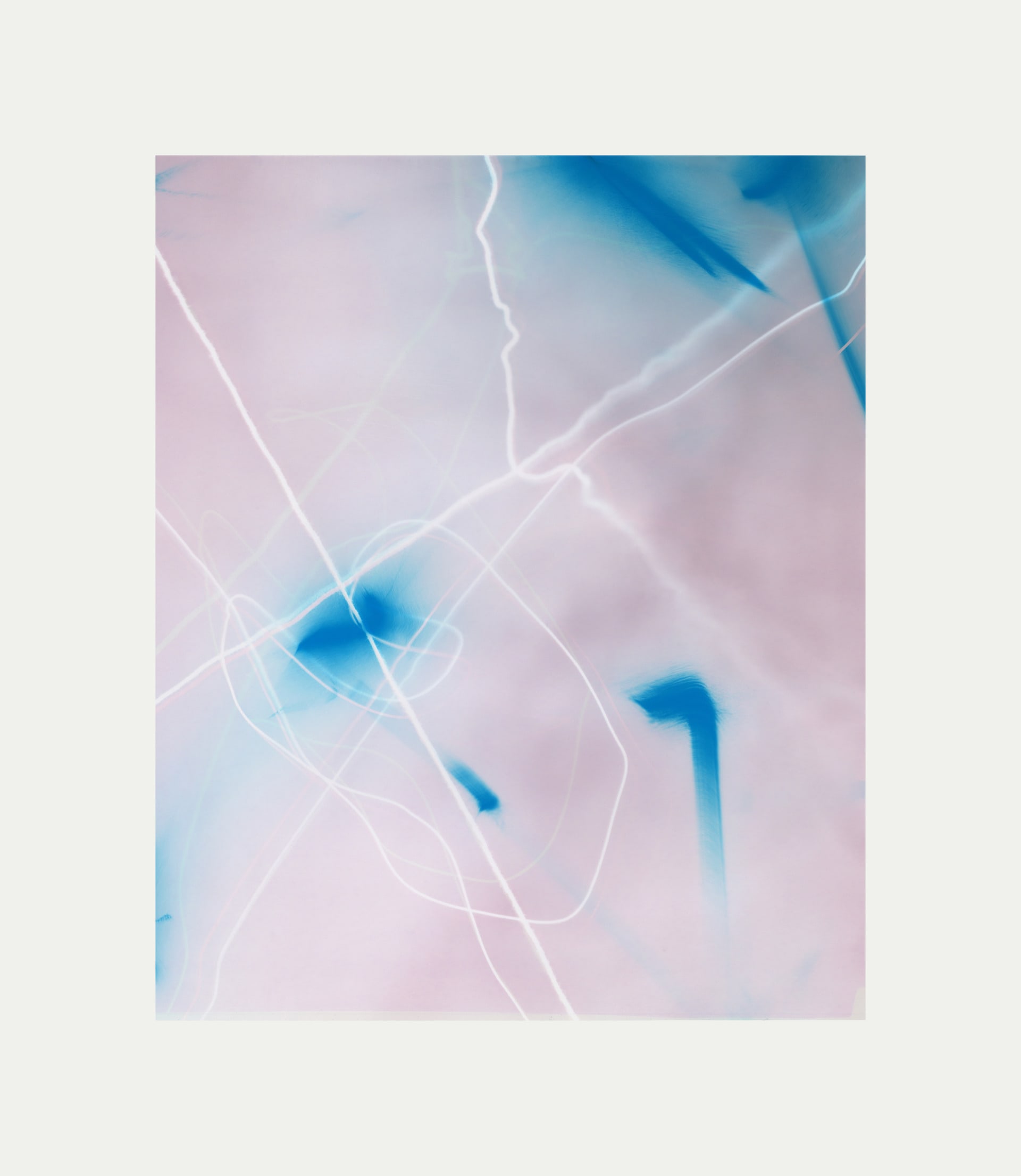  A darker pink photogram with flashes of blue and a white string assembly