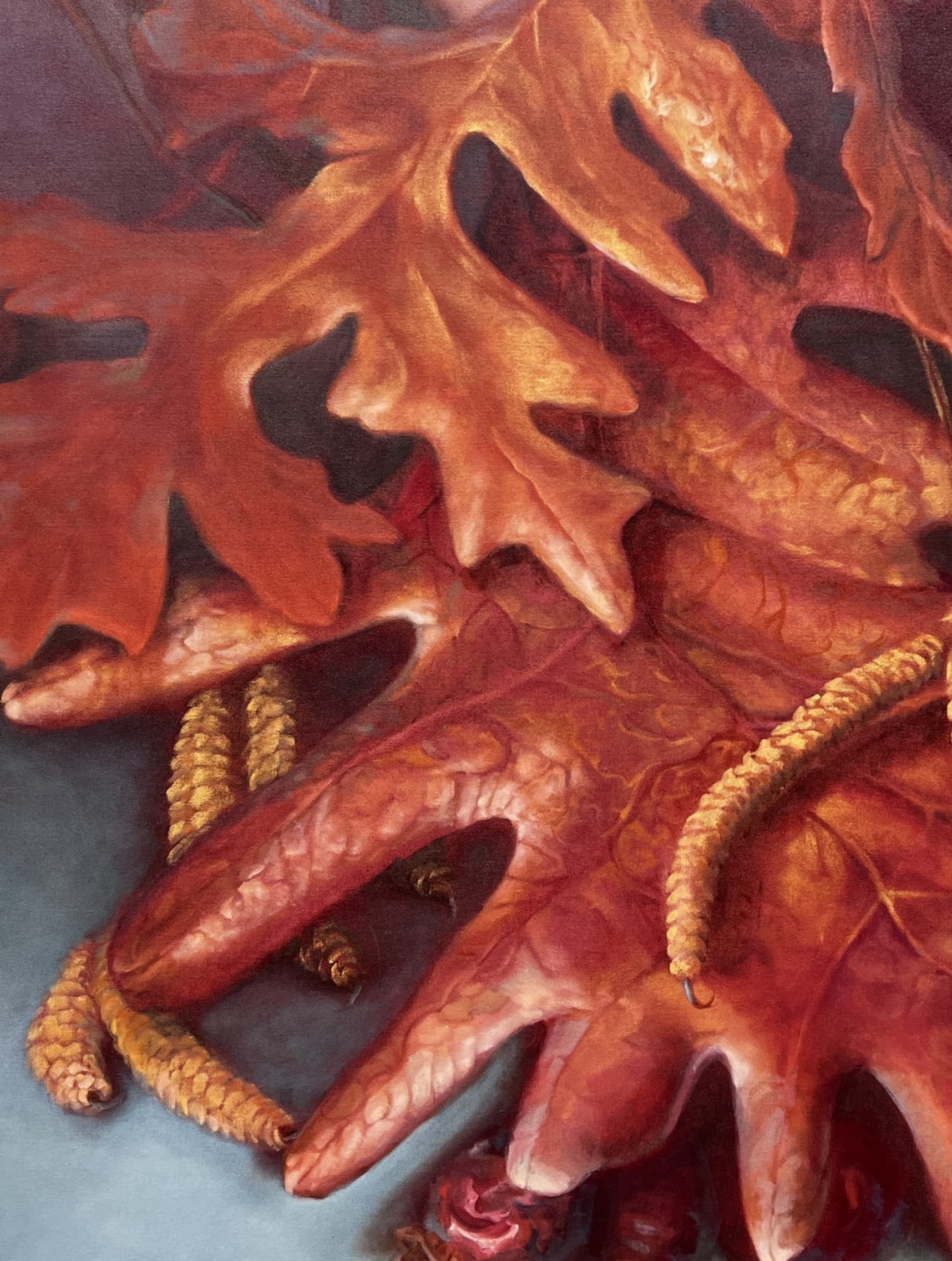 detail of a large painting of a gryphon arranged with oak leaves and birch blossoms