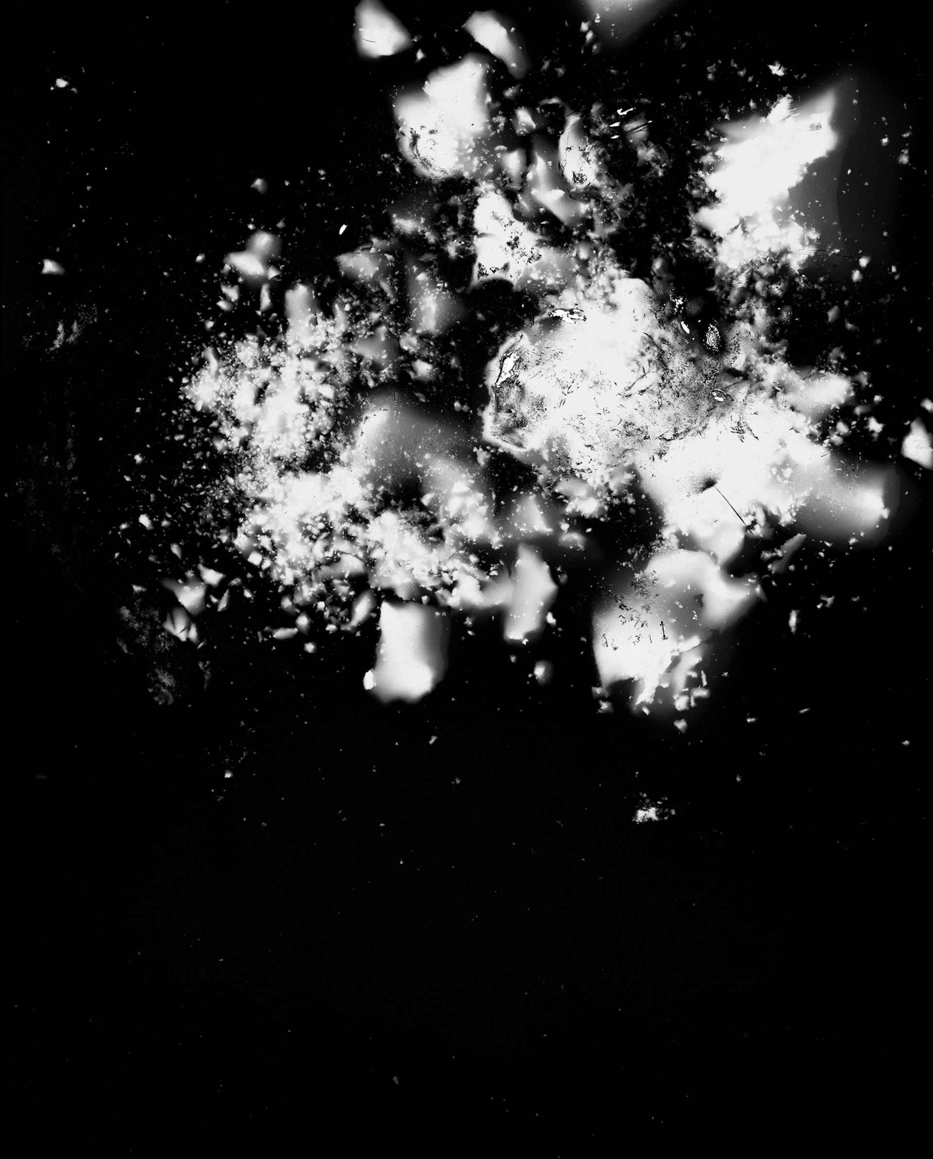 Black and white photogram of chalk being crushed into 5x4 Negative 