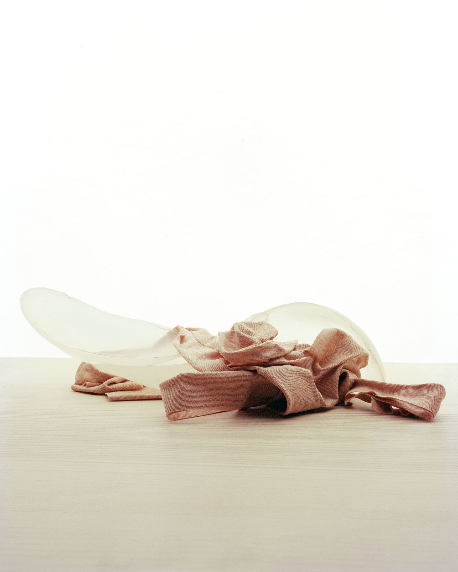 a still life image with breast tapes and shoulder pads