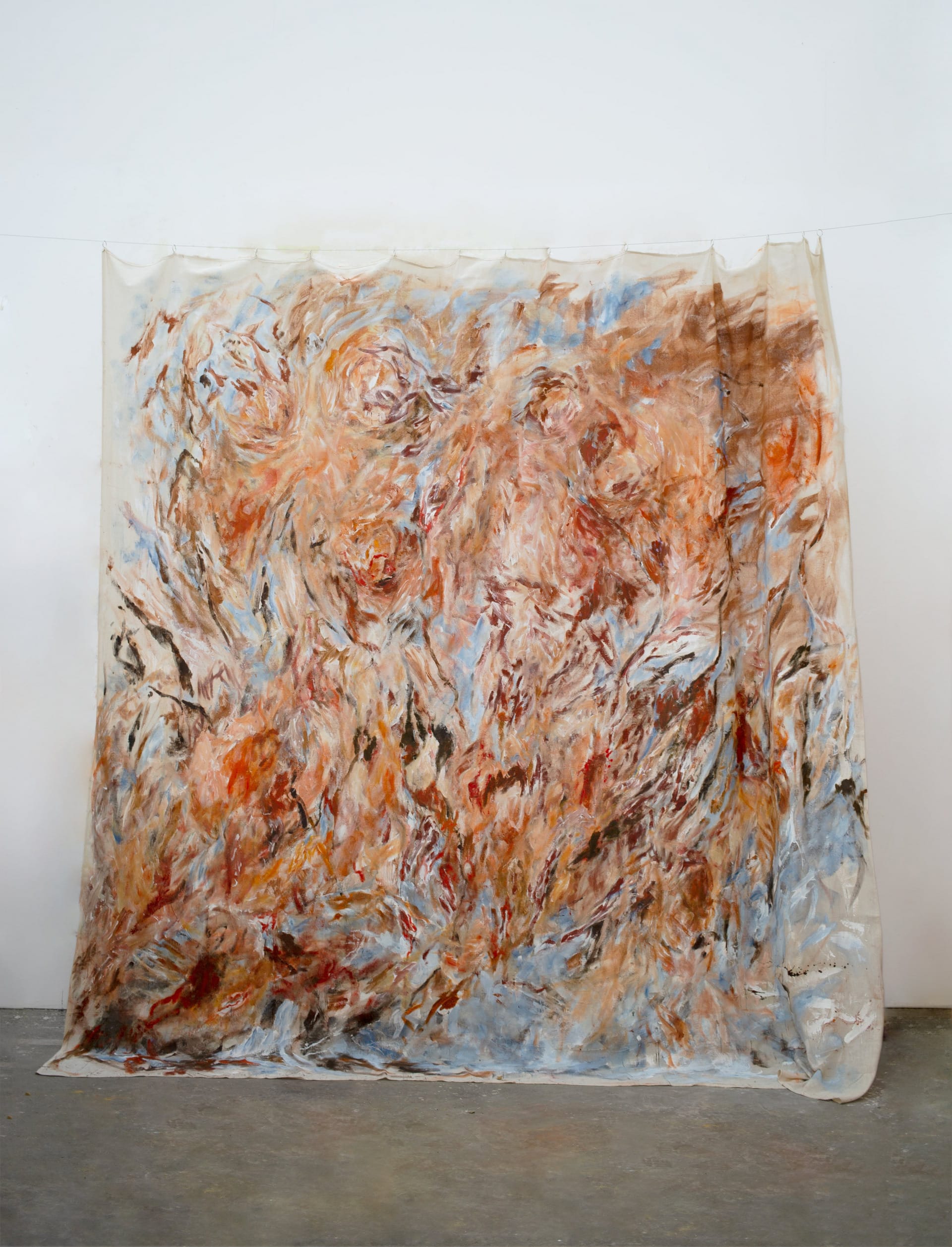 large 3.7 meter painting; orange and faint gray/blue weave together in a violent fire