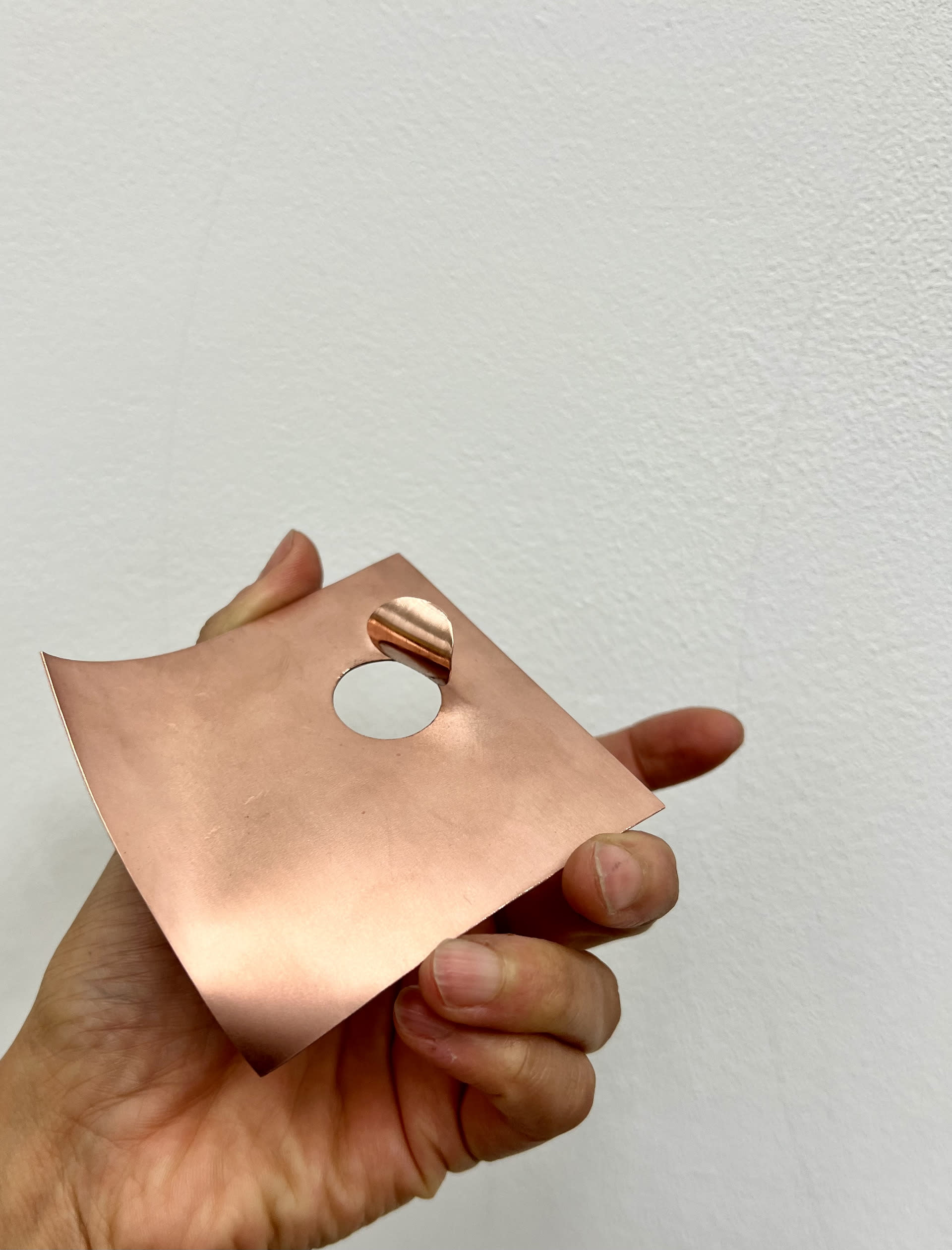 Copper post it with hole peeled back