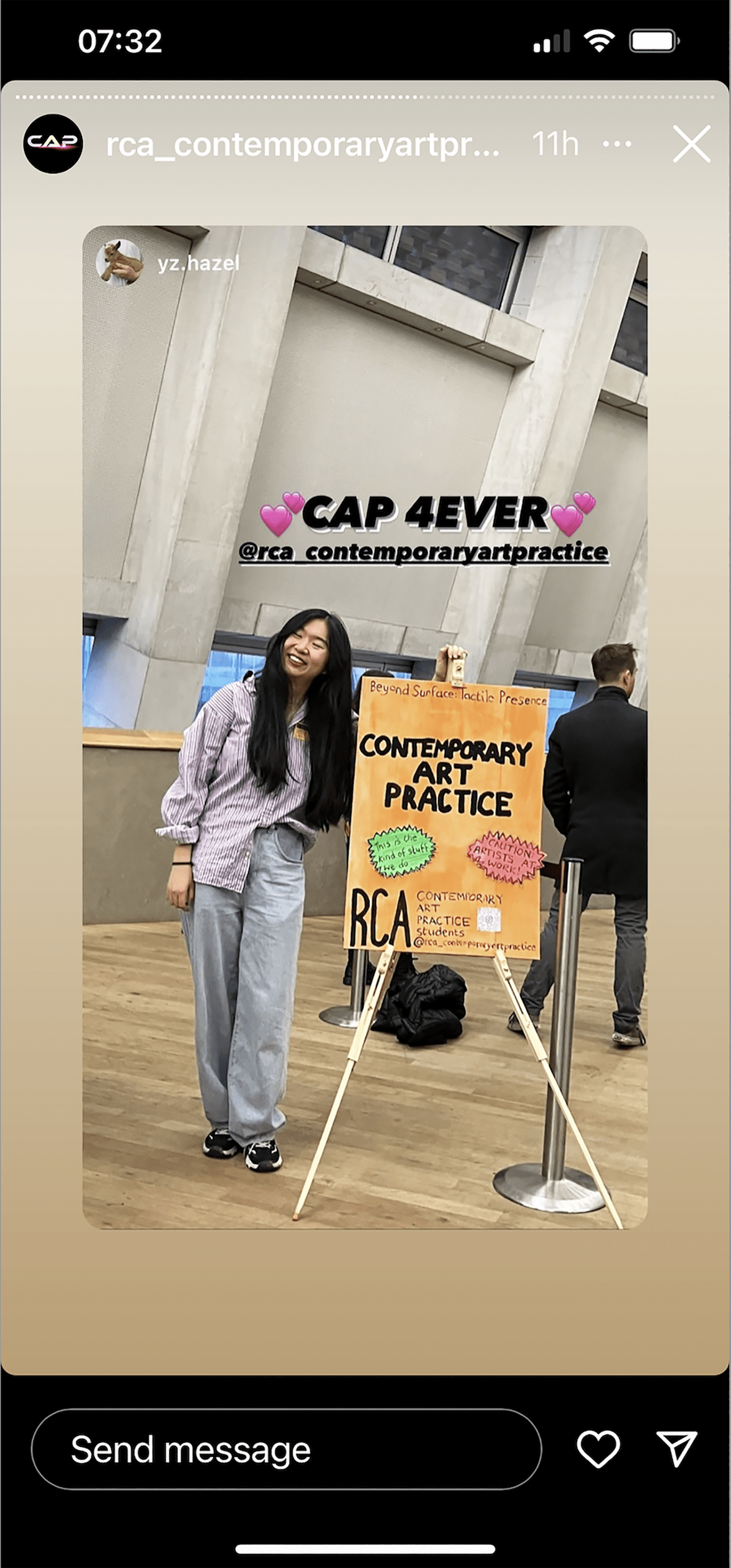 Yz.Hazel's instagram post showing them posing with a sign saying Contemporary Art Practice at Tate Late