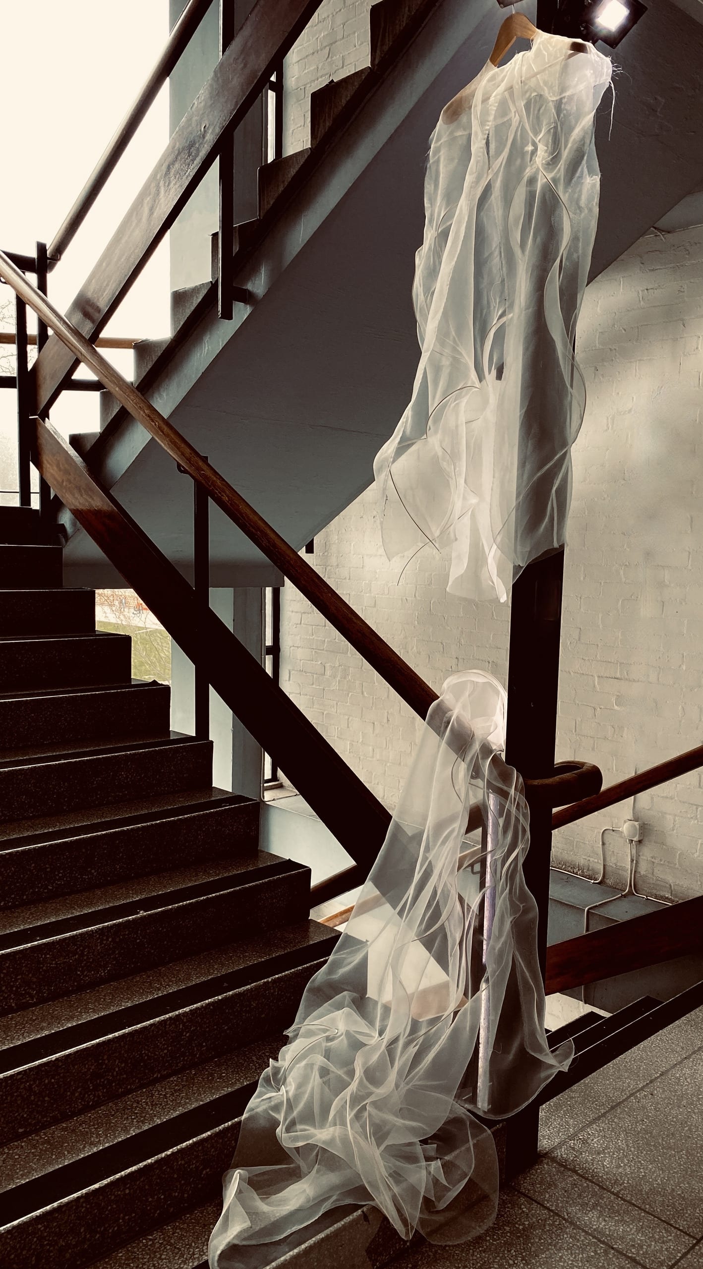 drape work of rattan shirt on staircase