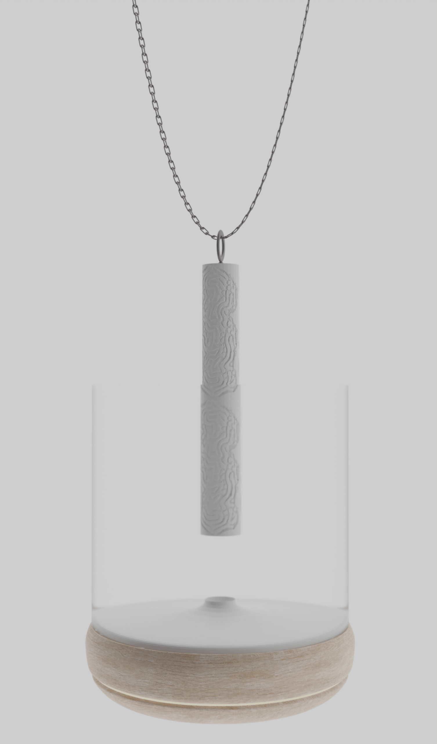 Rendering of a microbe friendly necklace pendant inserted into a base made for microbial dispersion through the air.