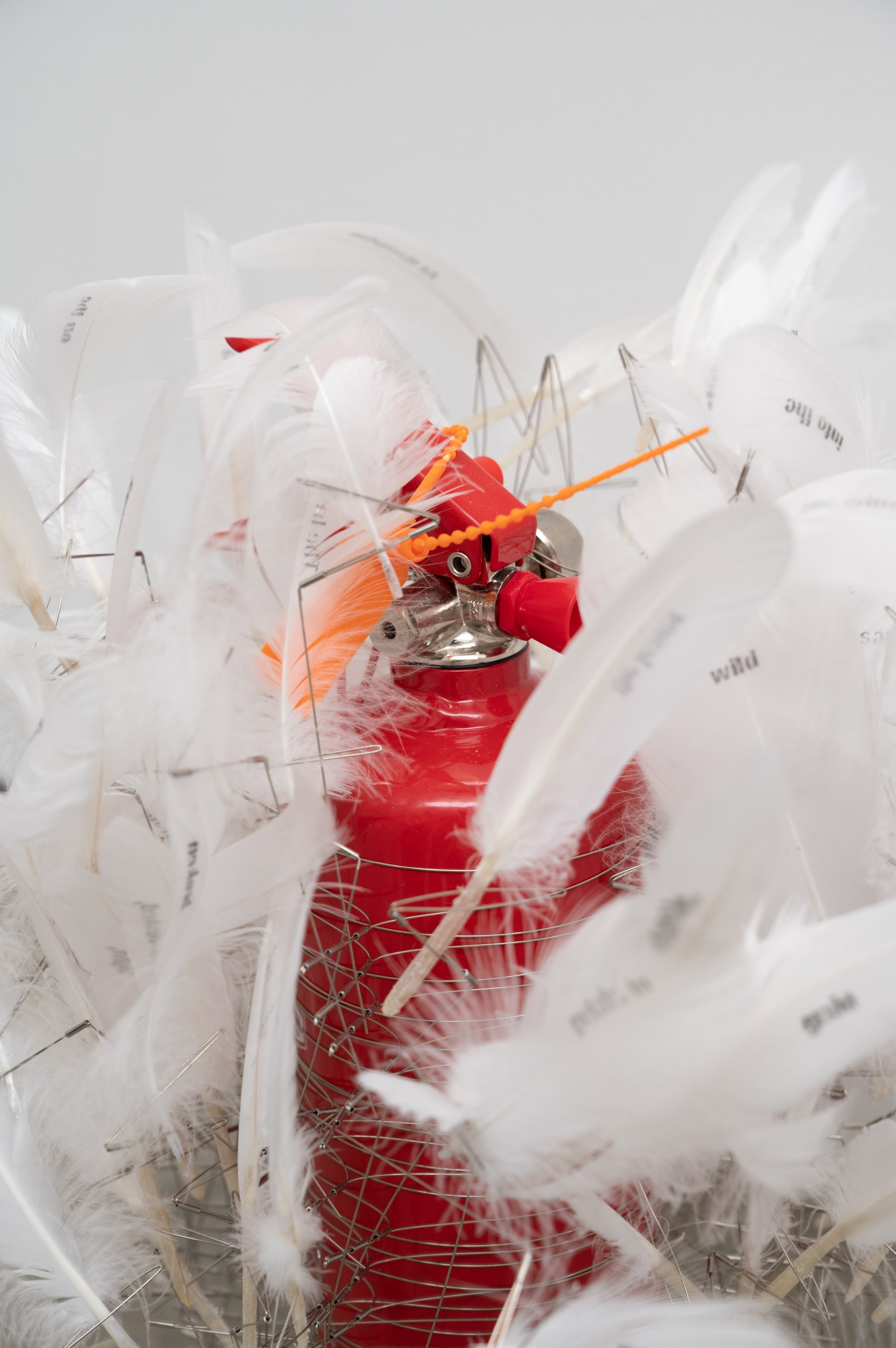 'The sun is sinking’, Fire extinguisher, stainless steel wire/tube,  white feather