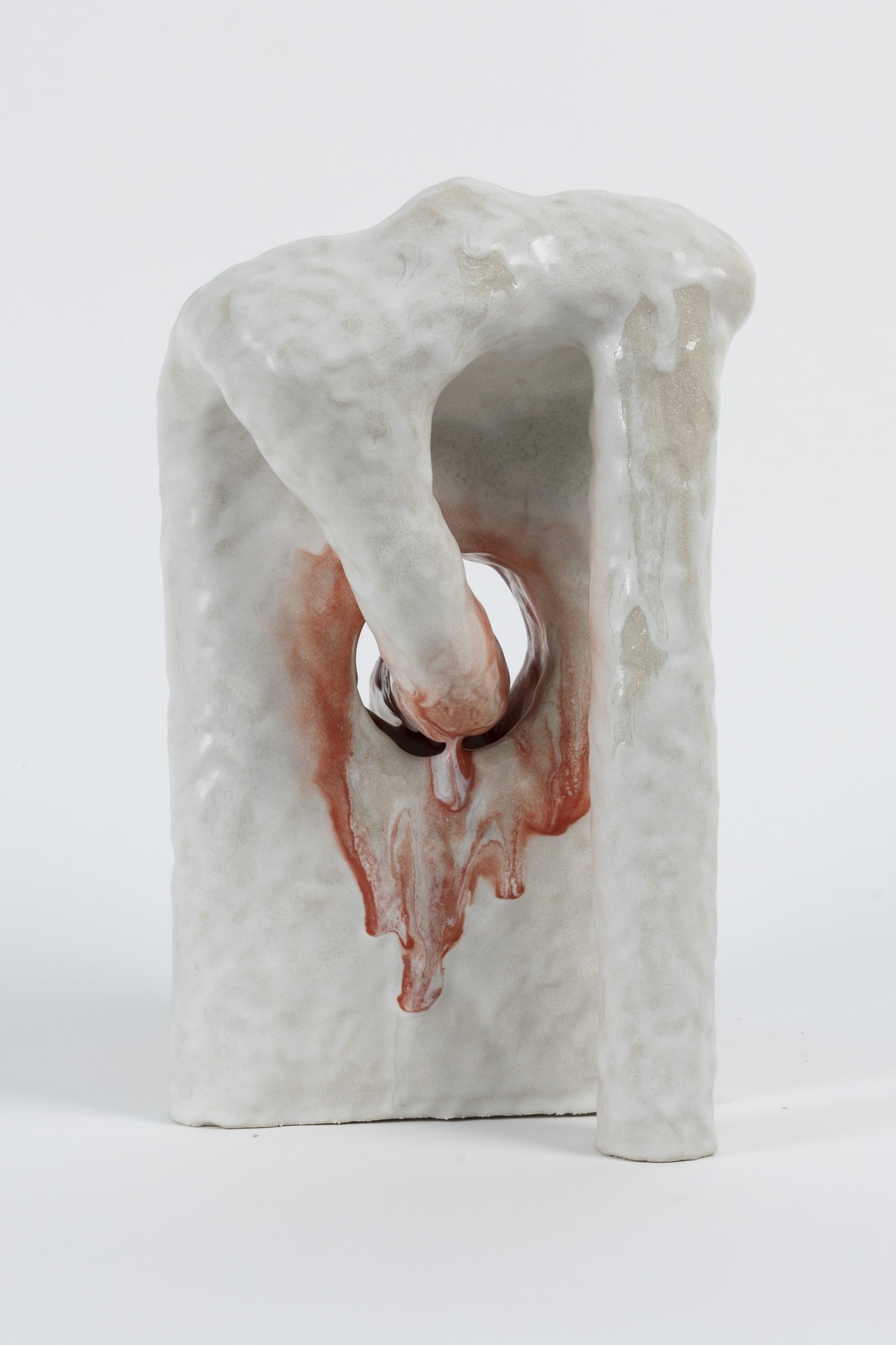 ceramic sculpture, white and red, runny glaze, front view