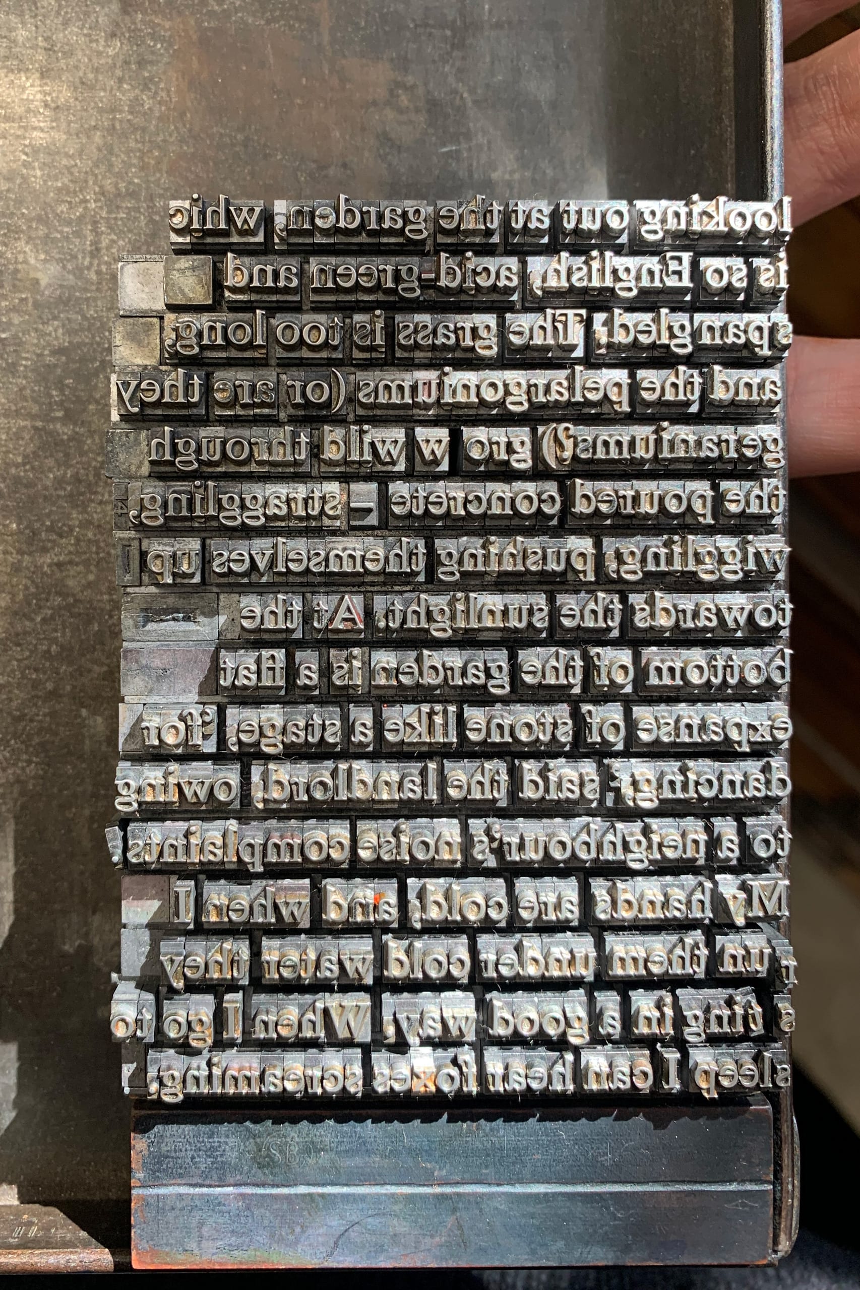 An image of a letterpress gutter with type set.