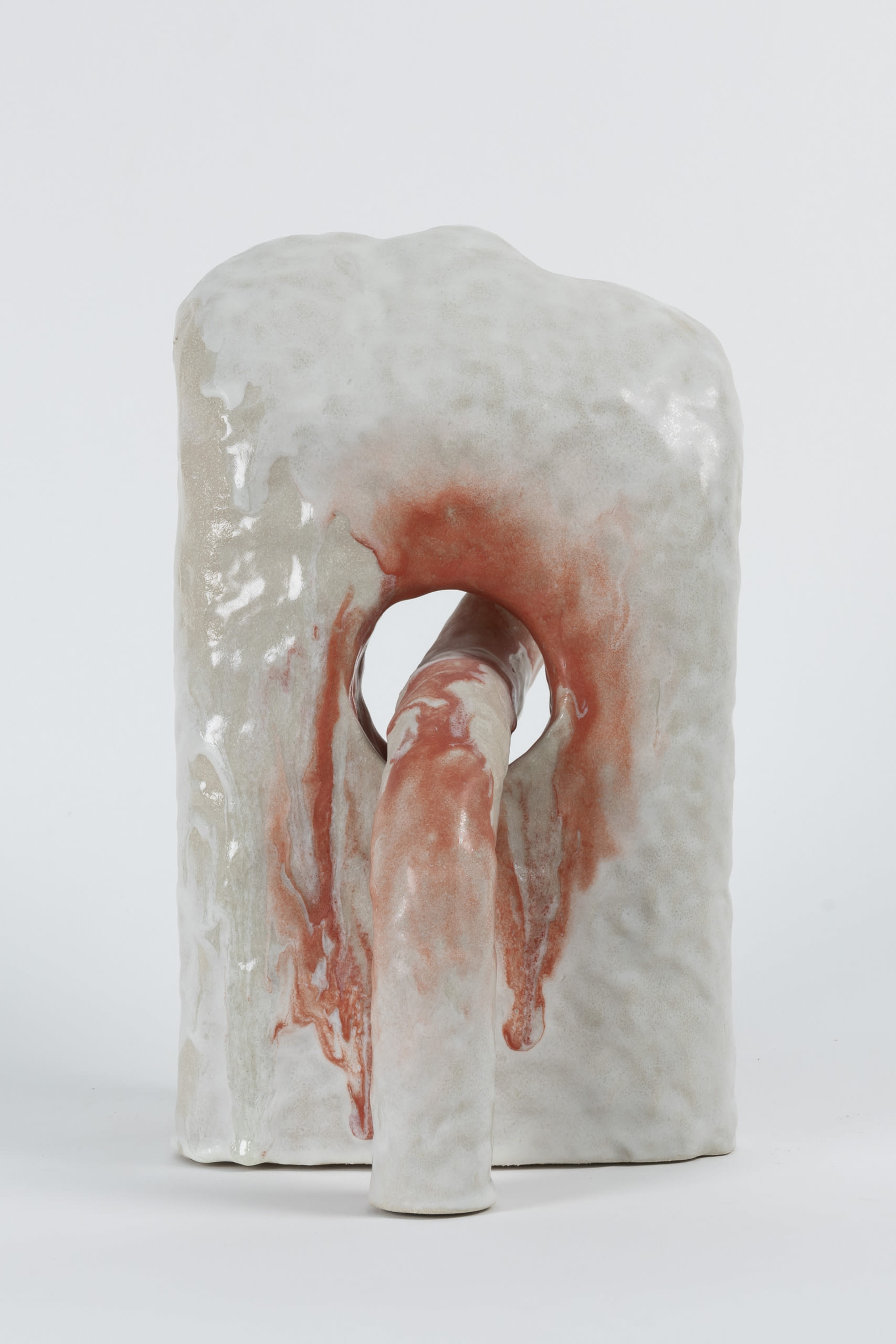 ceramic sculpture, white and red, runny glaze, back view