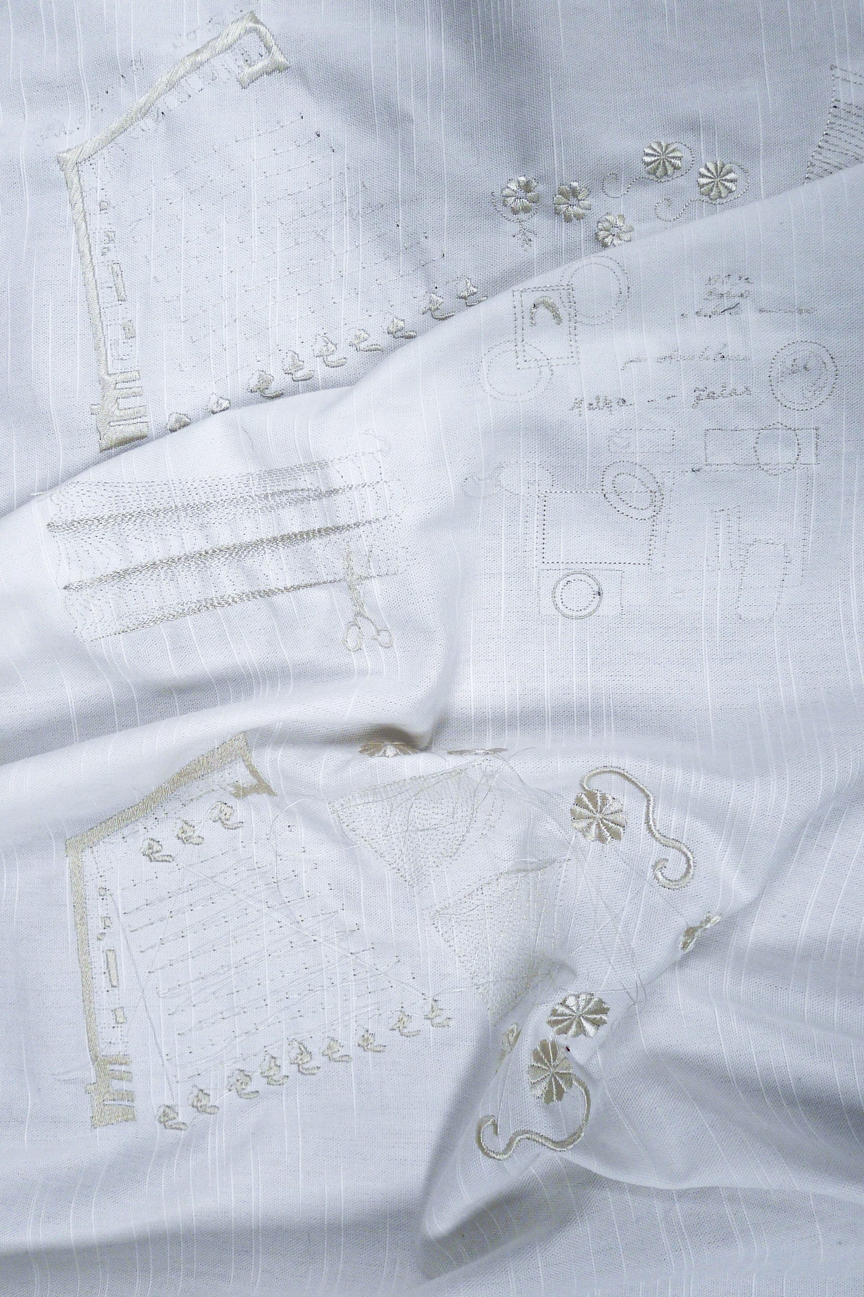 white embroidered cloth