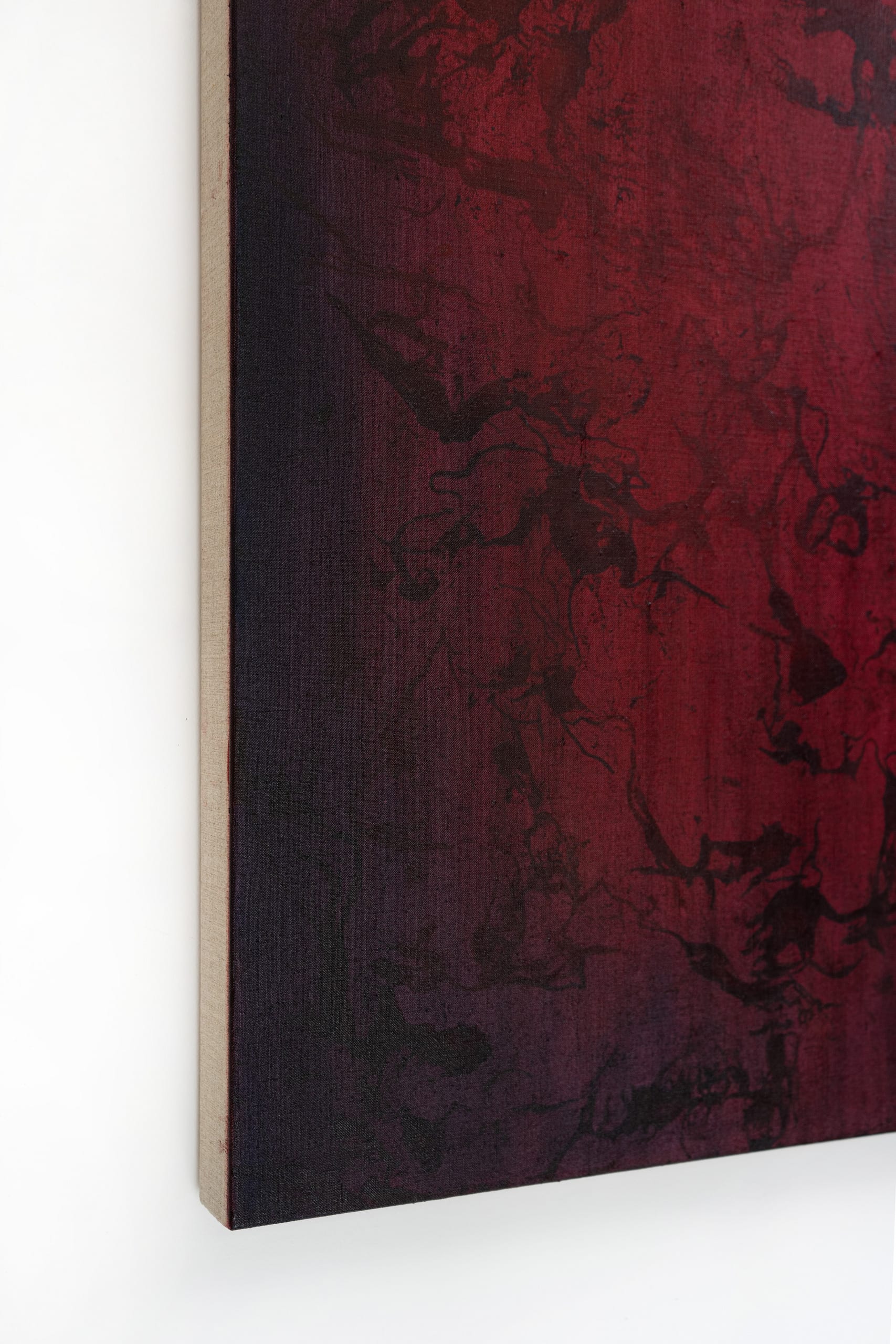 details of a dark red oil painting on linen with different thickness of lines 