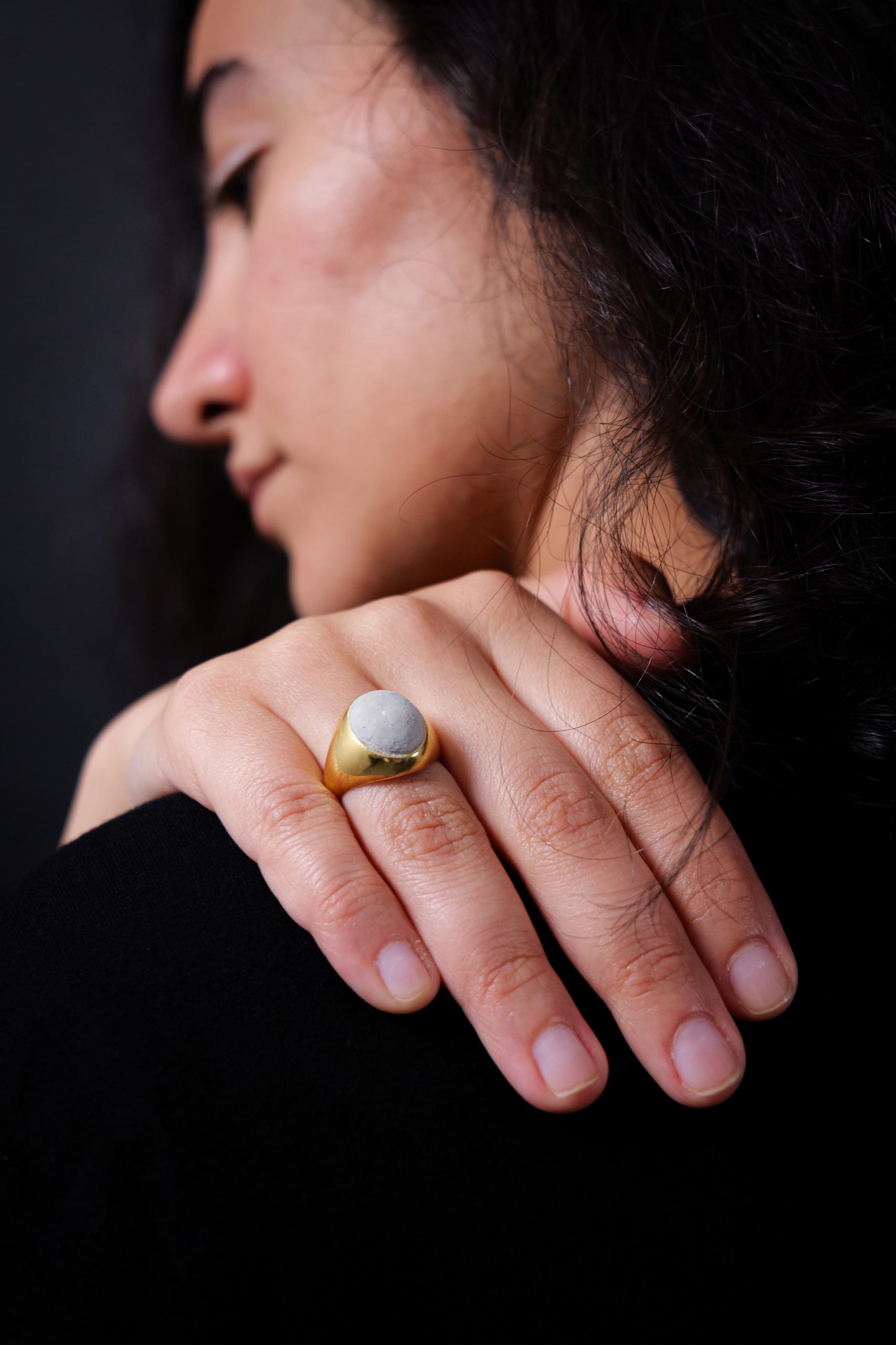 signet ring with a stone made from erased words(eraser)