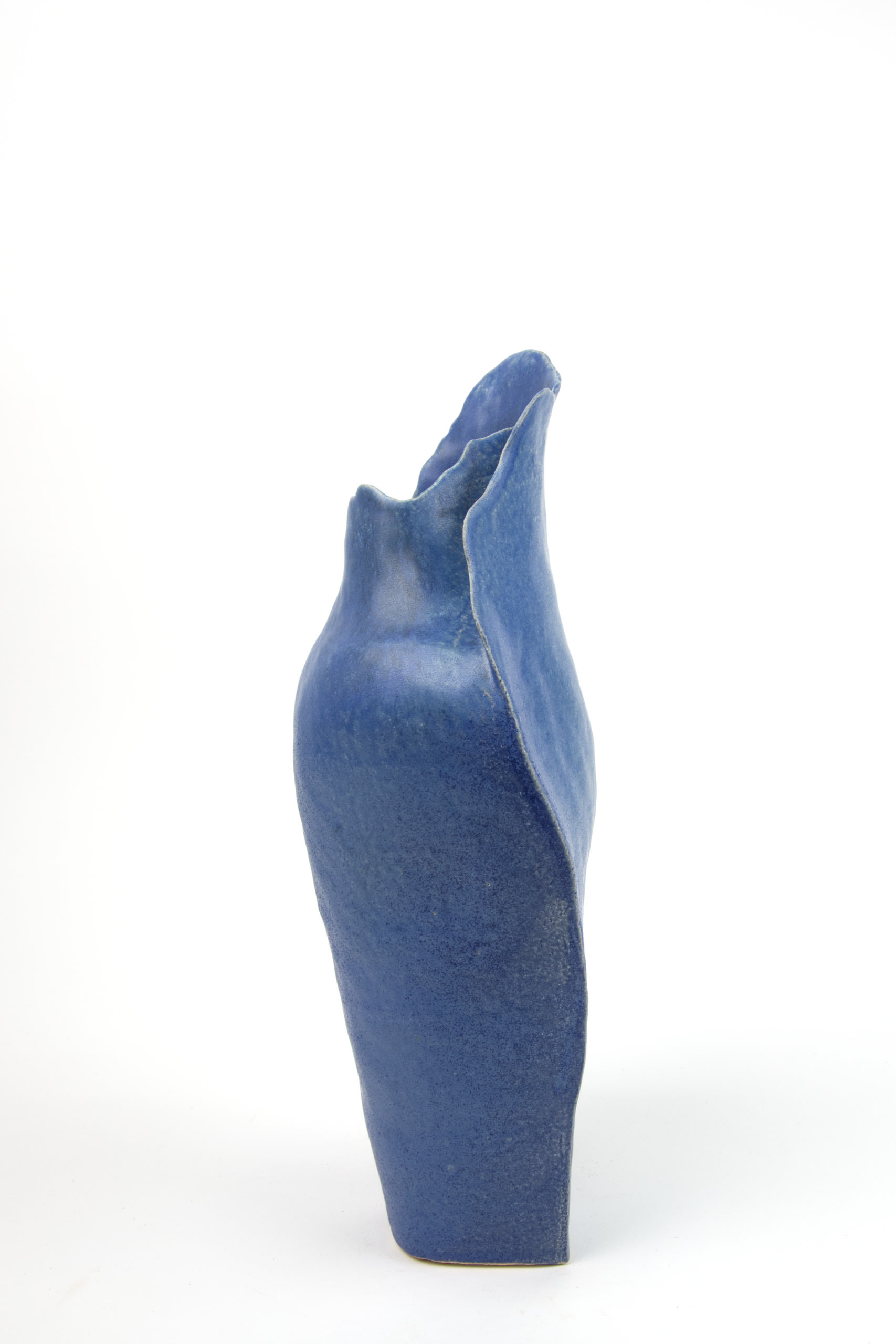 a blue curved ceramic vessel