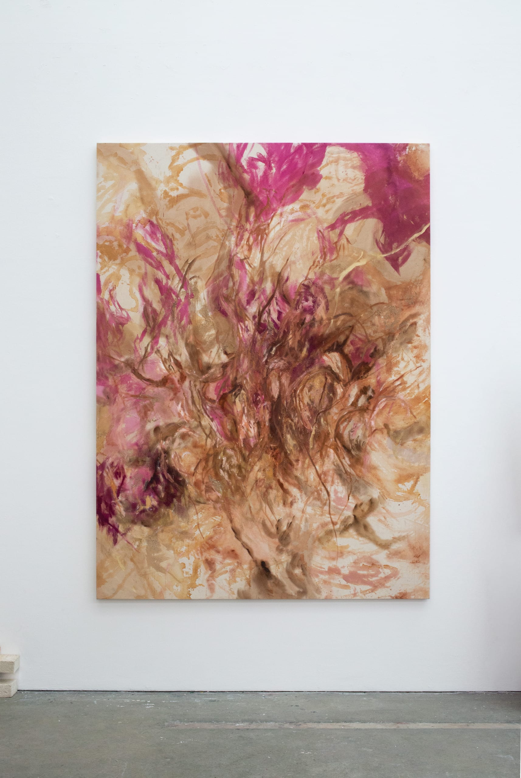 stretched pink/brown abstract painting 