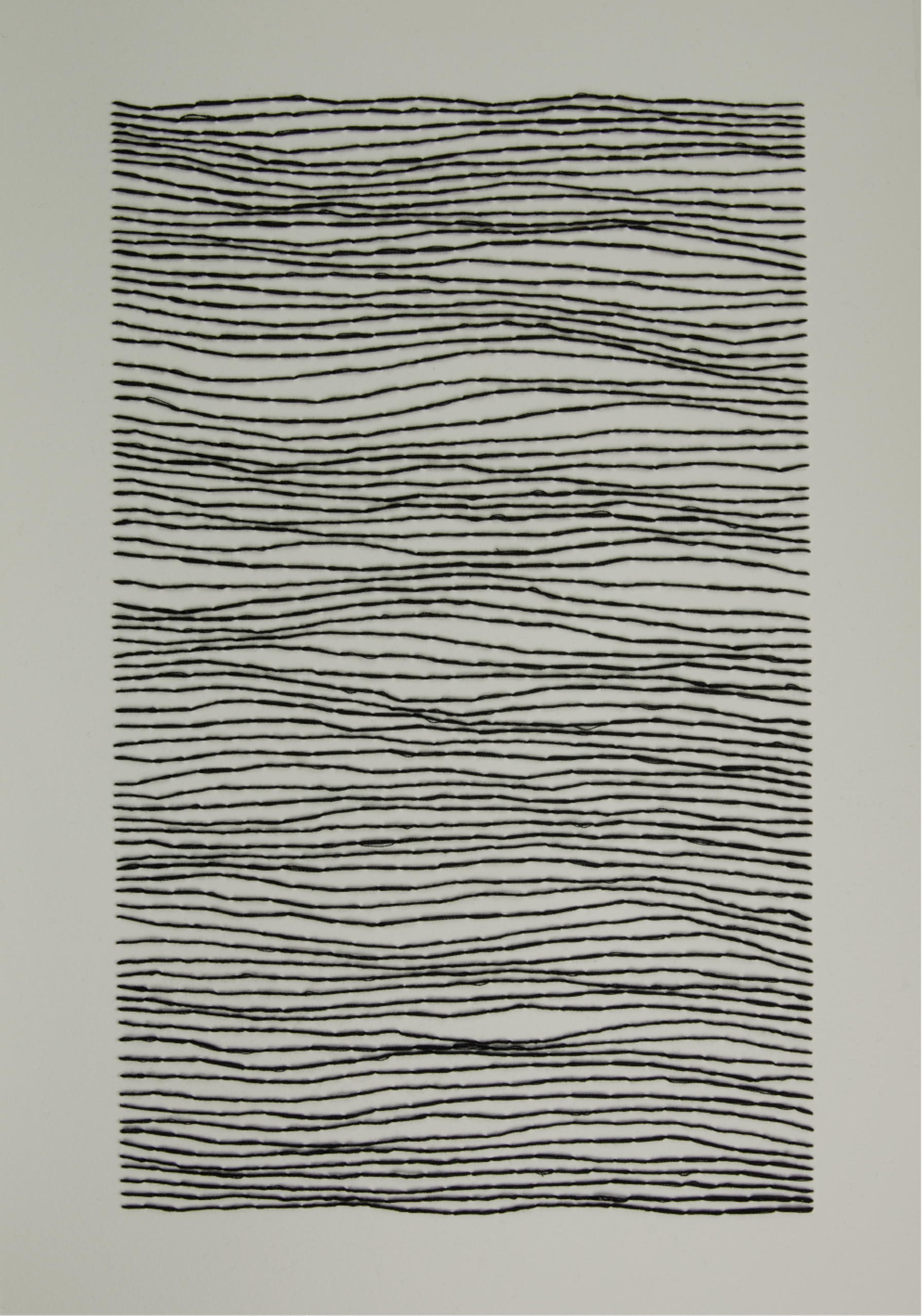 Horizontal black lines embroidered on paper