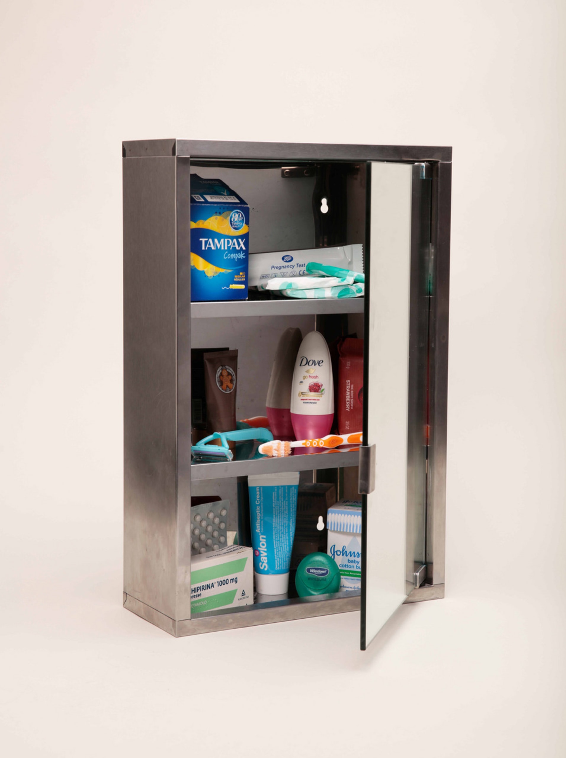 Photograph of bathroom cabinet, where its contents enable the user to achieve a socially acceptable level of personal hygiene 