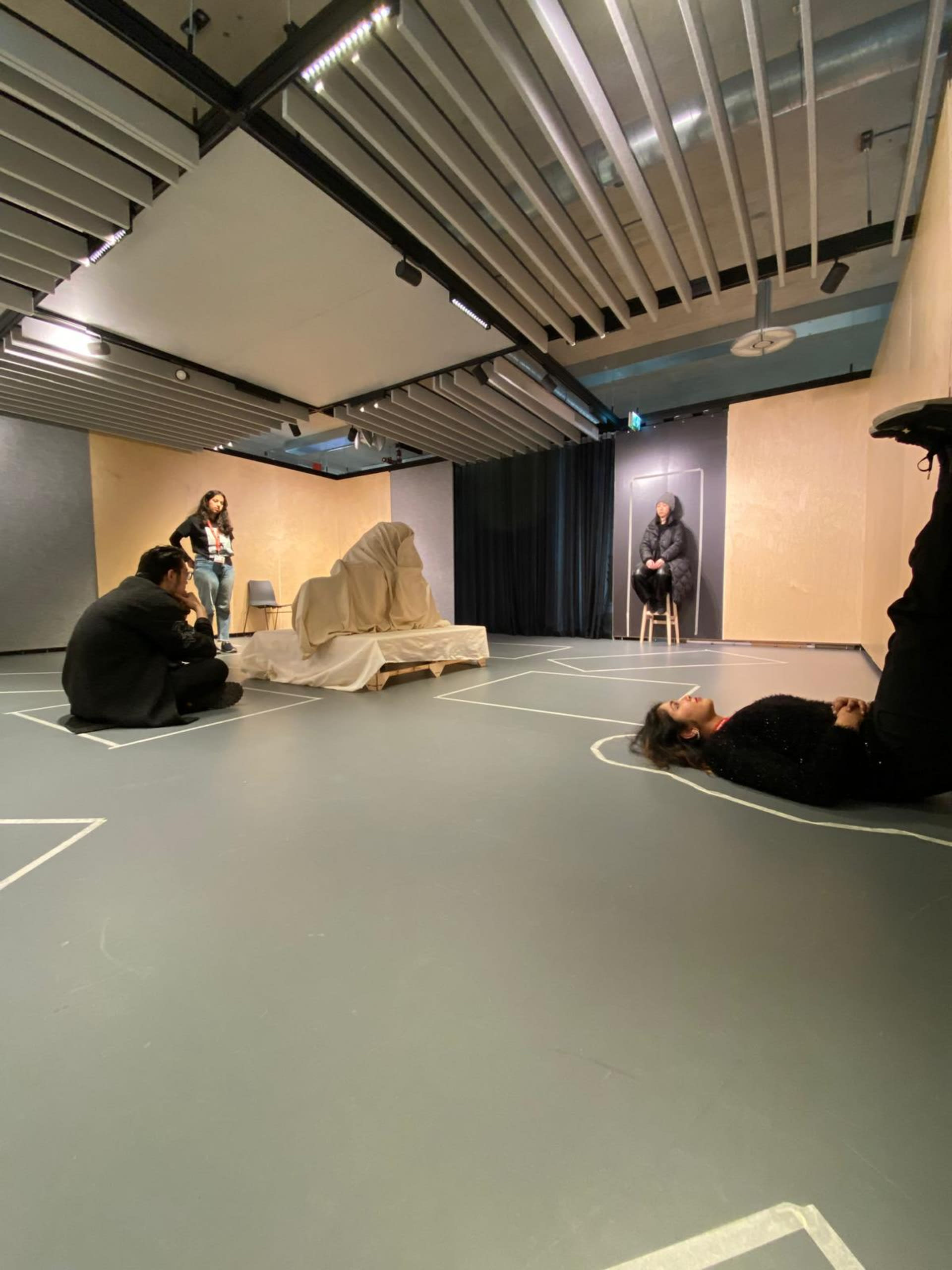 A staged environment featuring participants actively performing and engaging with the space.