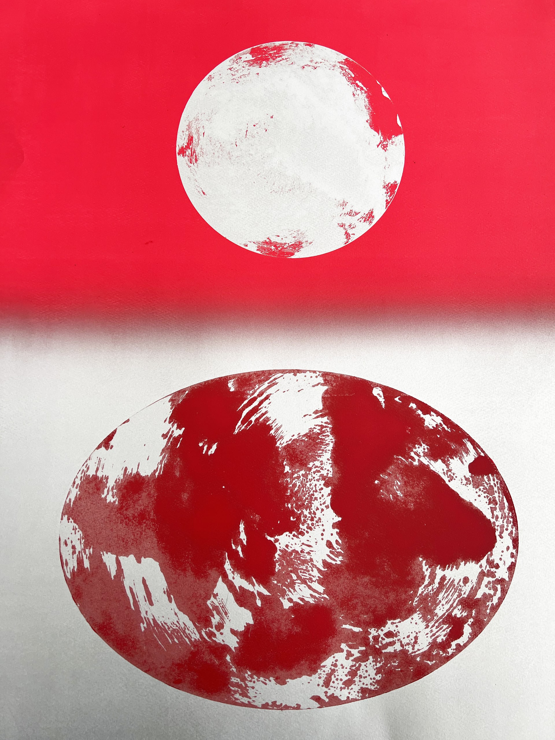 Monoprint using circular shapes of red and silver.