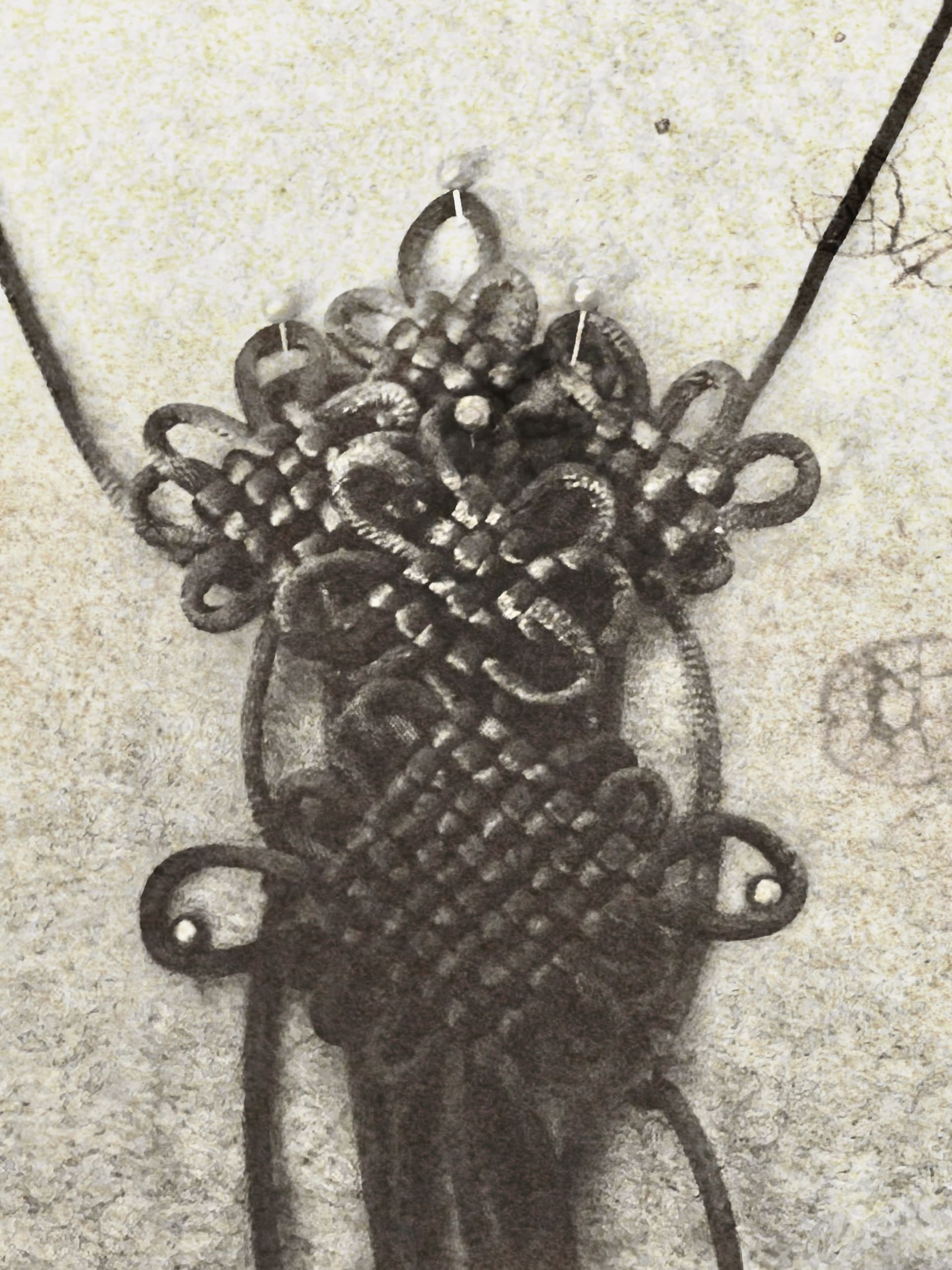 A knot necklace with rope.