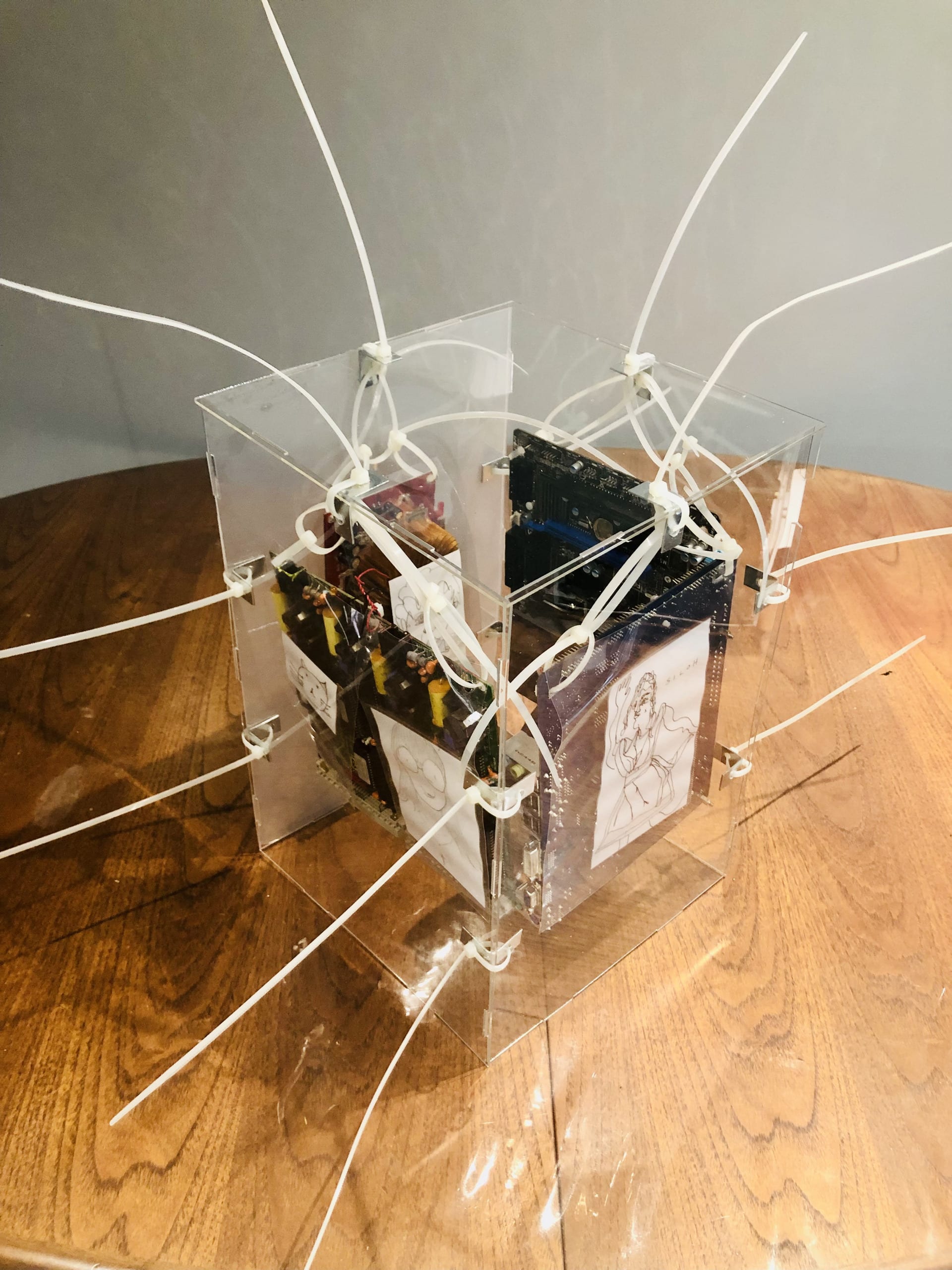 Poetry: Literary Art Found in the Output of a Random Word Generator [Love,      Nature,      Death,      Identity,      Spirituality,      and Time], cable ties, metal, pencil on paper, plastic wires