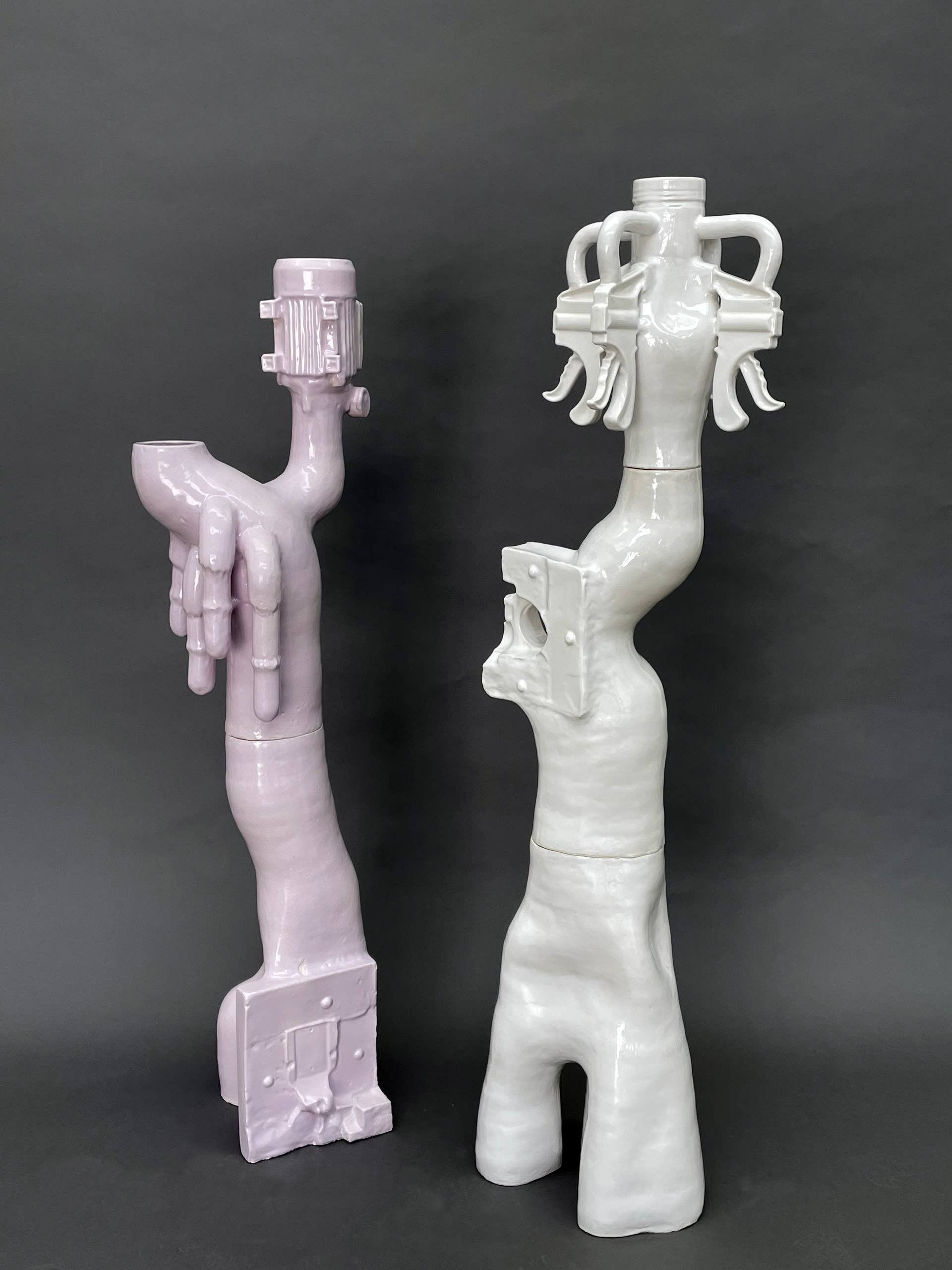 Stackable ceramic sculptures, slip cast objects attached to hand built forms.