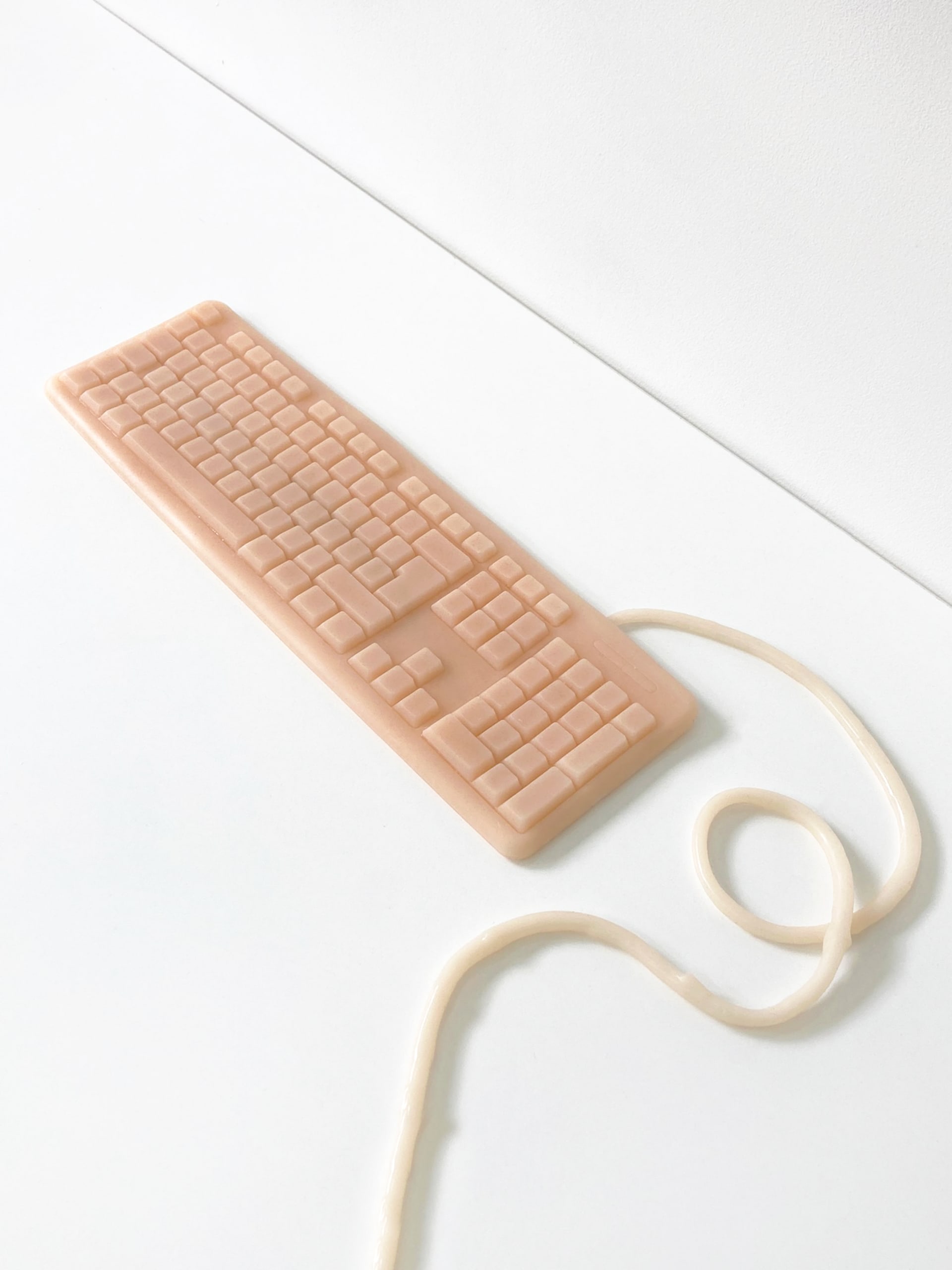 A keyboard made out of silicone to resemble human skin