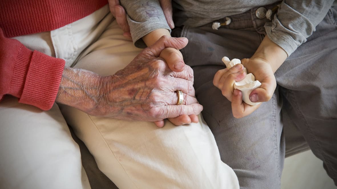 Holding Granny's physical hand and her silicone cast.