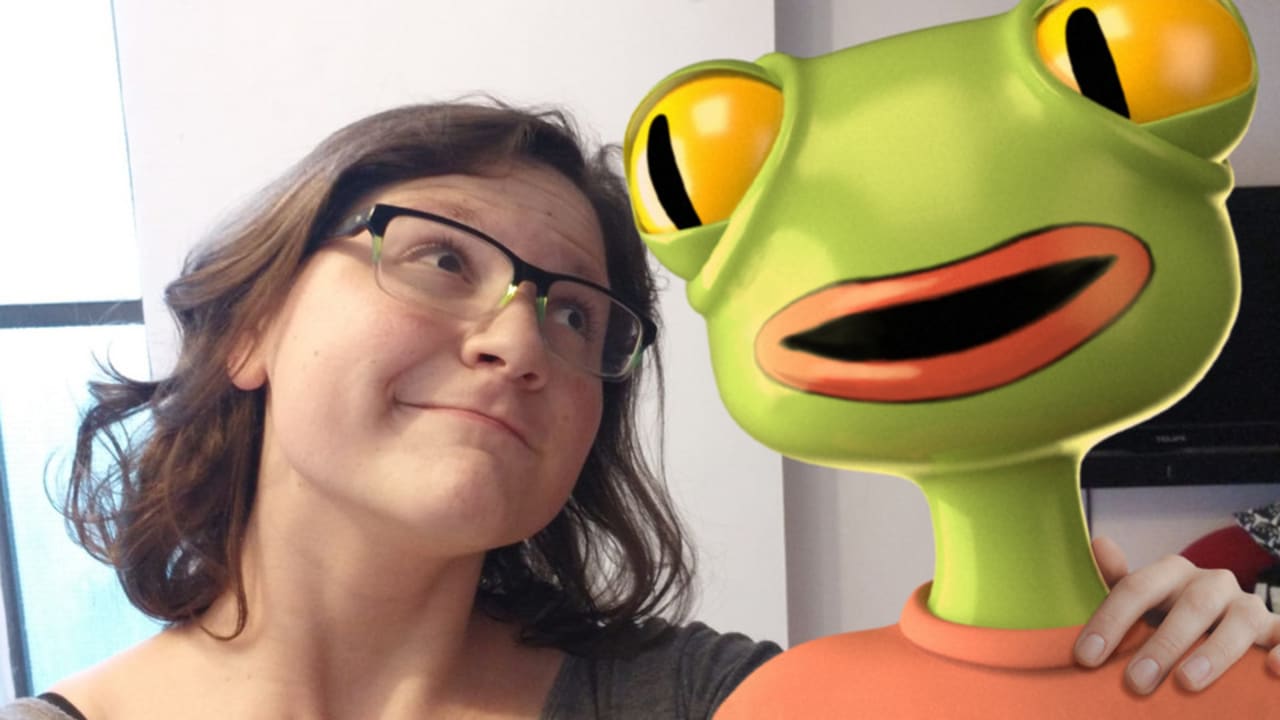 The artist posing with the main character from her animated short film "The Frog"