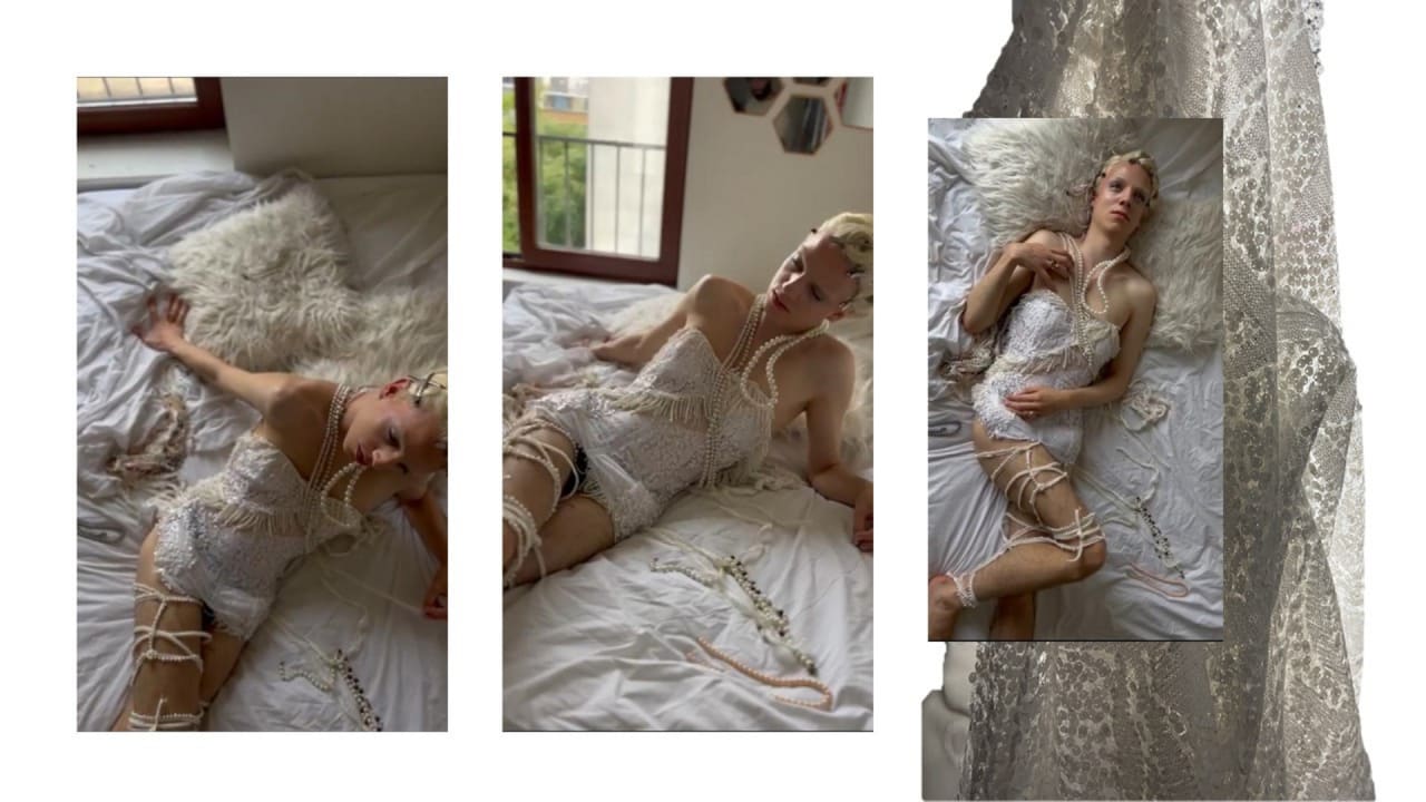 Person in white corset lying in bed 