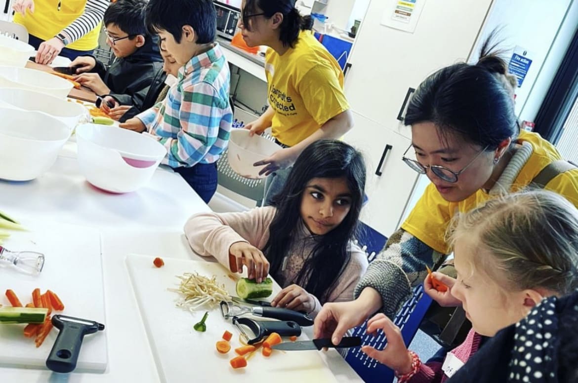 The pictures shows the process of the designer helping visually impaired children cut vegetables 