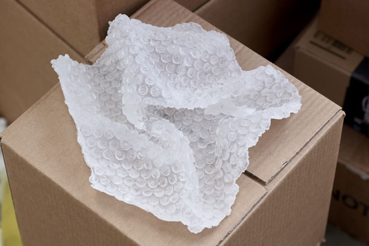 undulating clear glass bubble wrap on a card board box