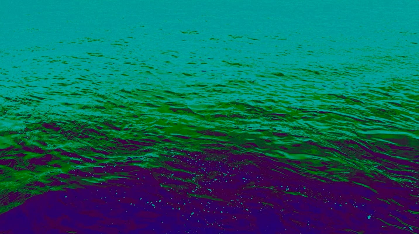 an image of a river with slight waves in blue, purple and green