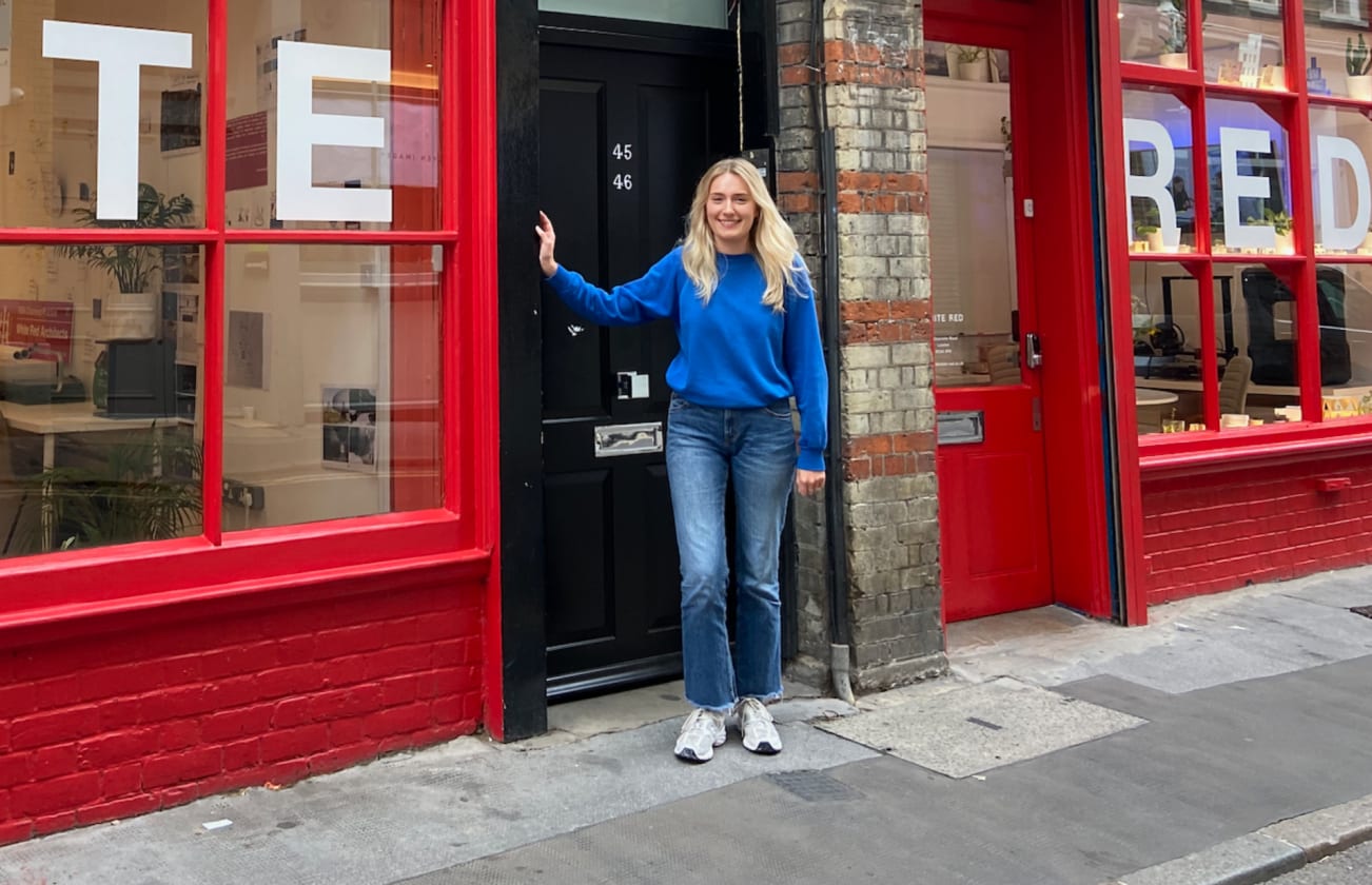 Ellie standing outside architecture firm