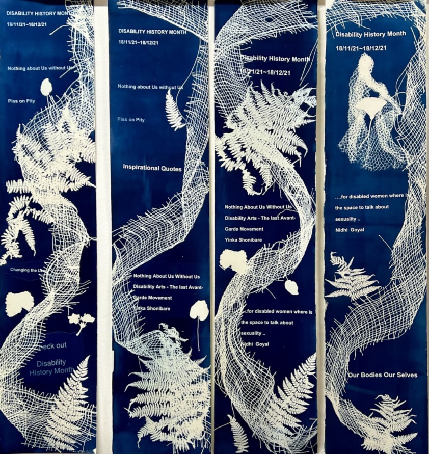 Disability arts slogans and collaged materials printed in white on a blue cyanotype backgound. 