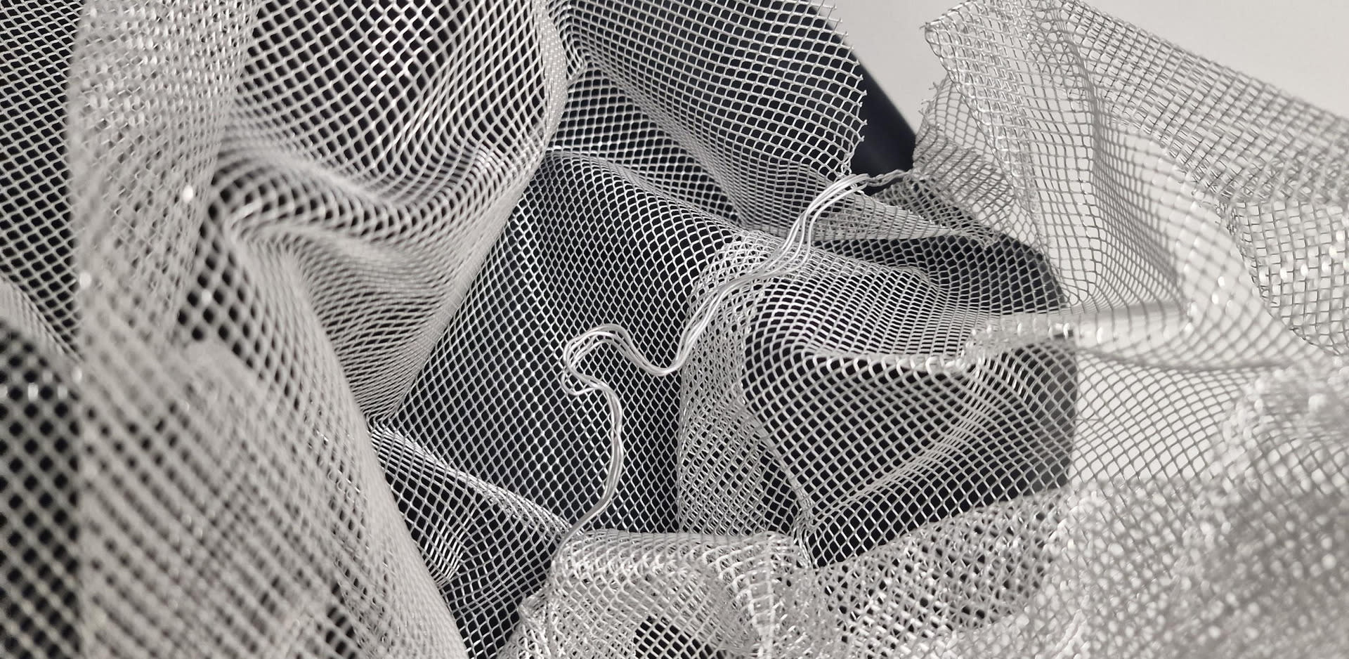 Wire mesh manipulated and sculpted to look like fabric