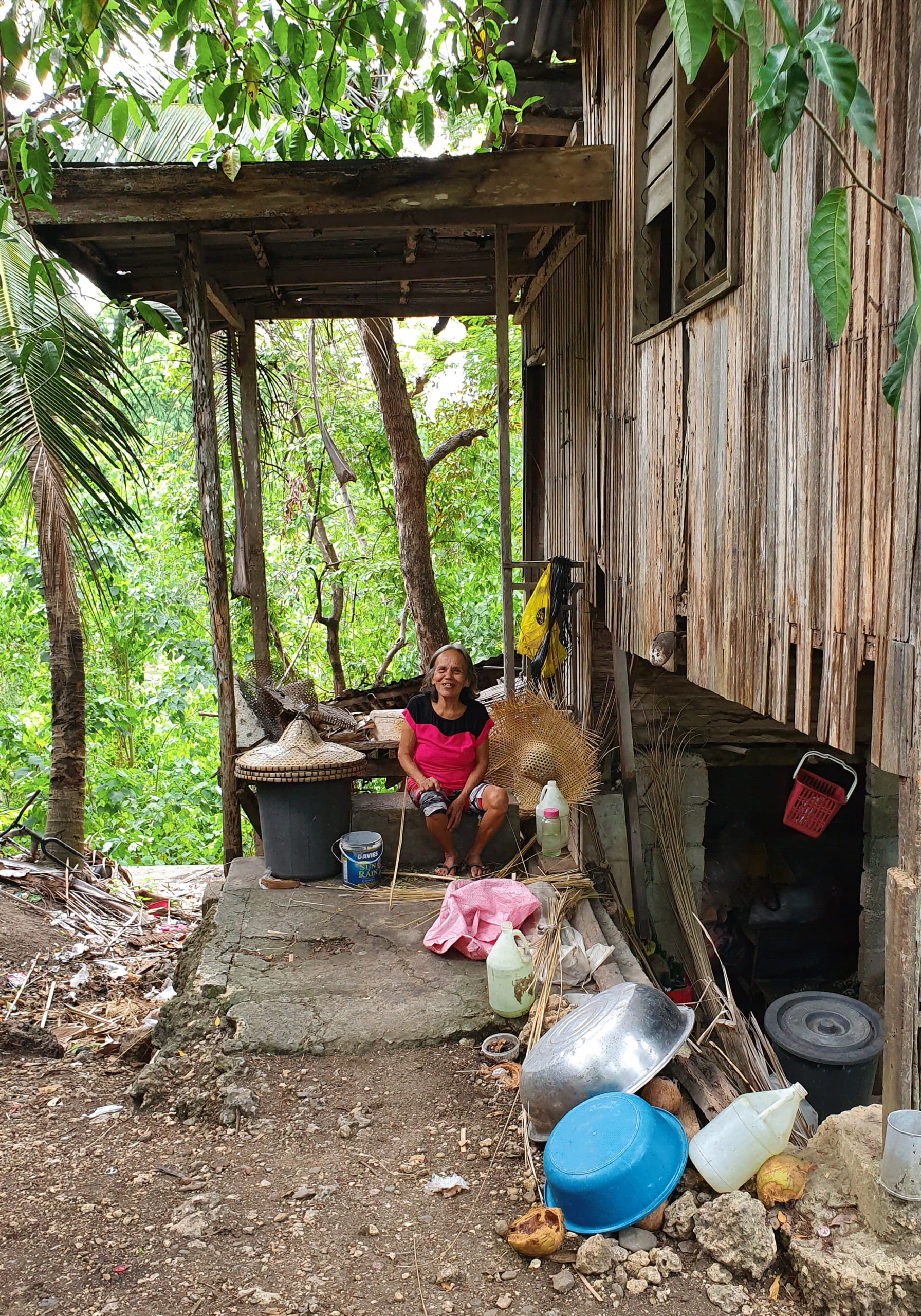 Rain hat maker, Cebu, the Philippines