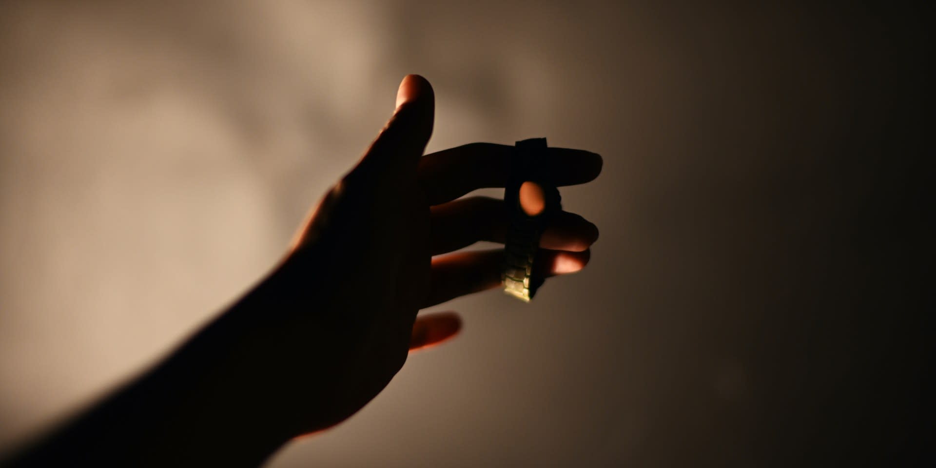 Self Reflection, Holding the watch; Photographed by Lunhua Kong