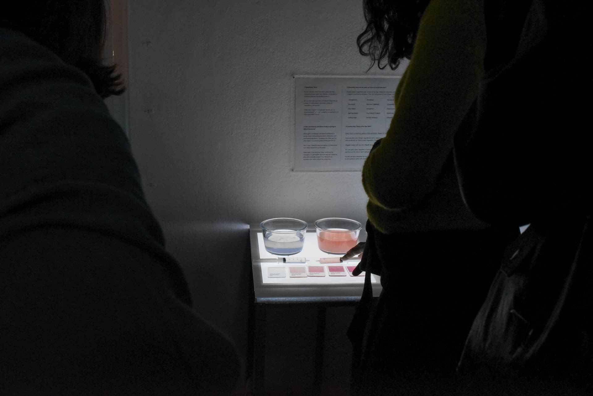 Exhibition scene - audiences interacting with props