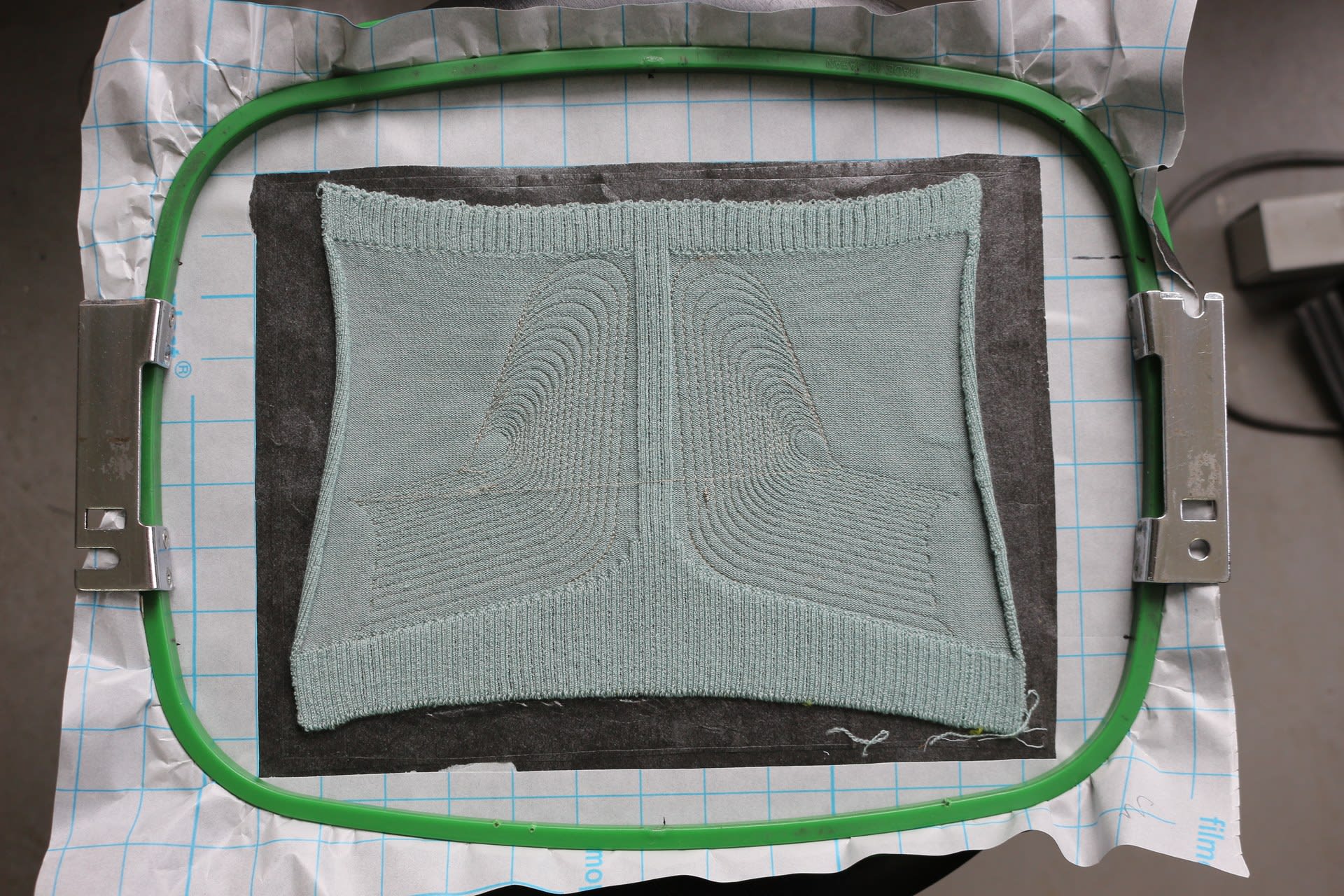 Embroidery of the conductive thread onto the knitted sleeve