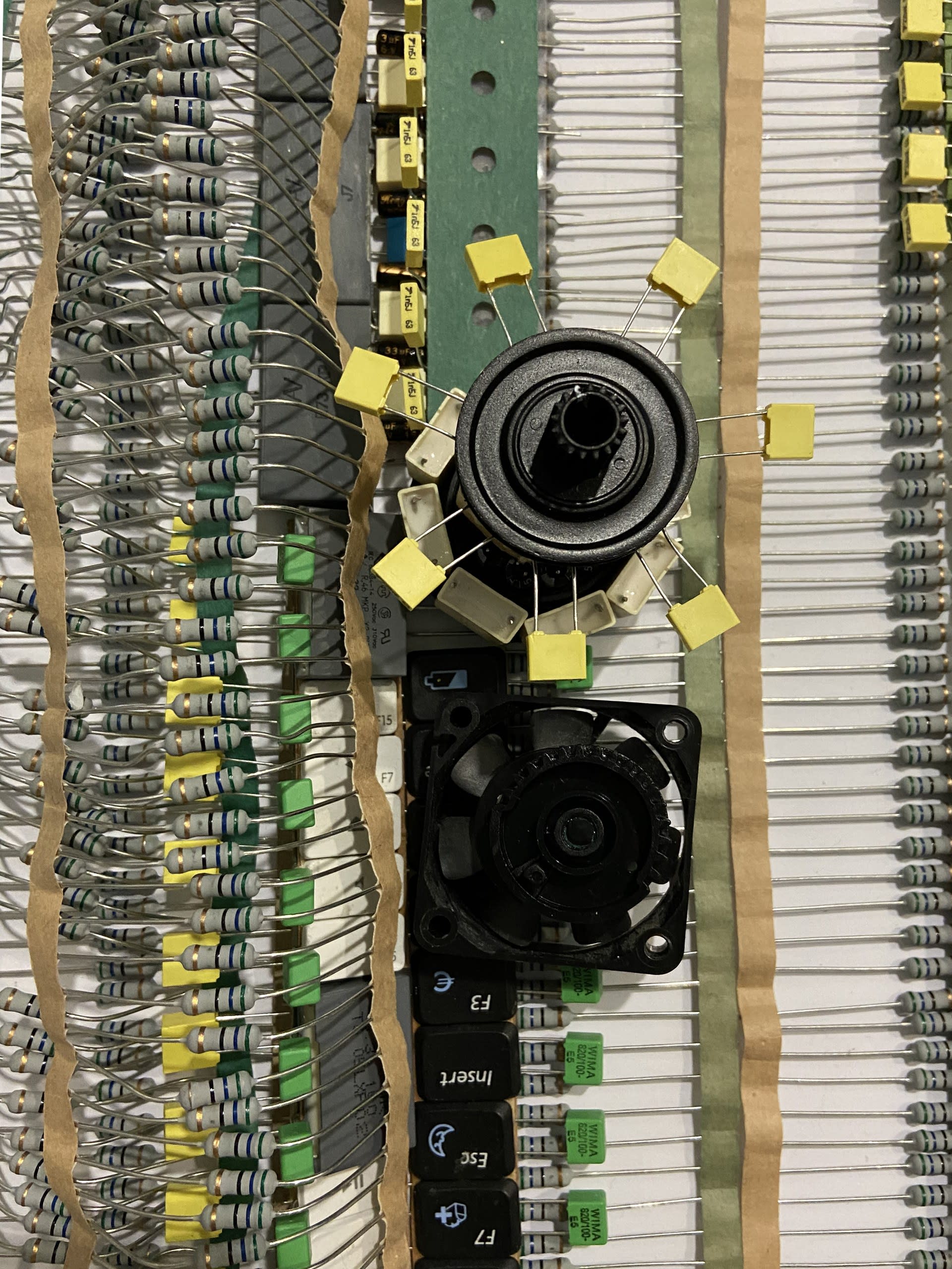 Capacitors, resistors and fans