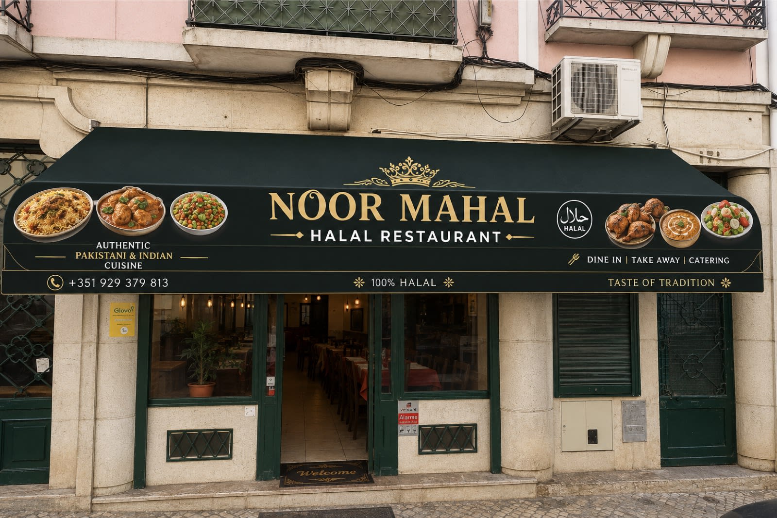 Noor Mahal storefront with its green and gold awning on Rua do Zaire