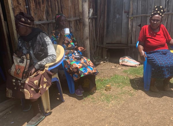 Women seated outdoors