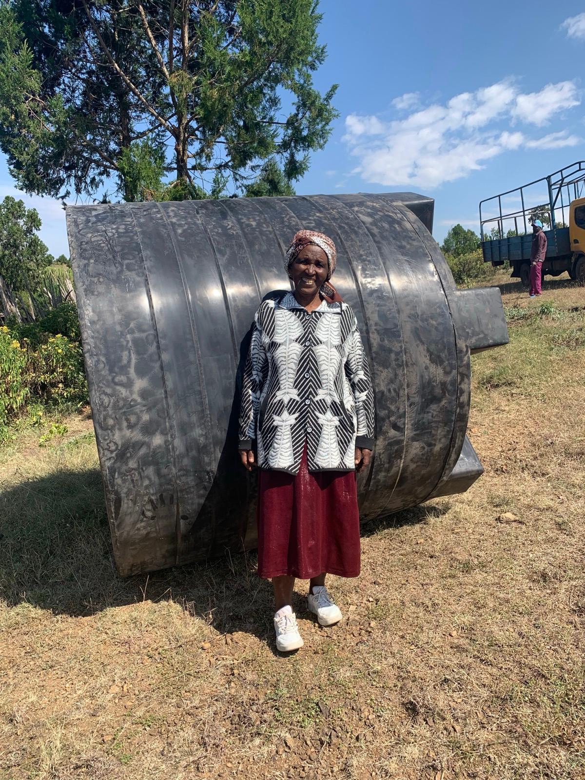 Water tank installation providing clean water access for elderly widows in Kenya