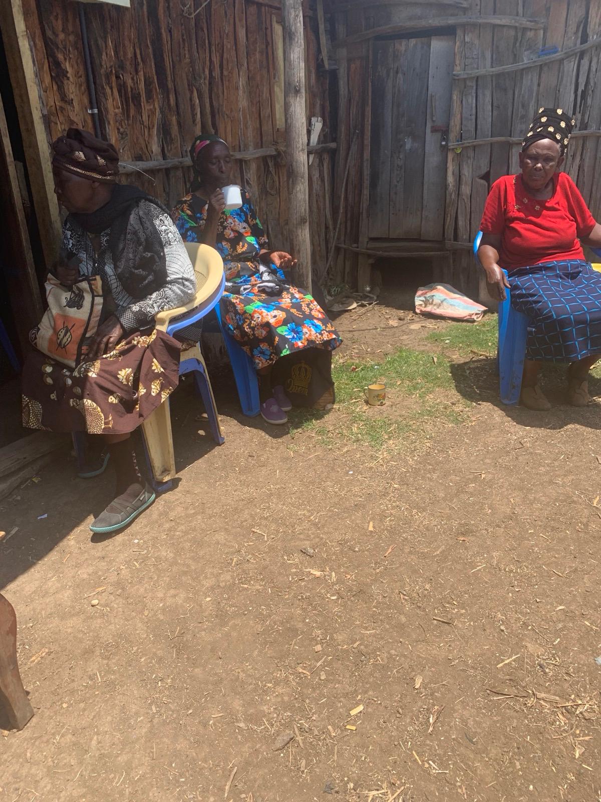 Women seated outdoors