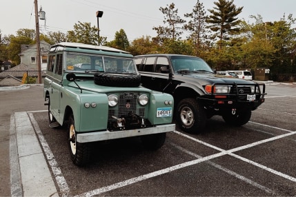 1964 LR2 Land Rover next to a 1996 FZJ80 Toyota Land Cruiser