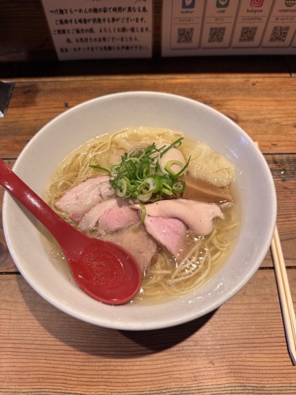 Clear broth with thin noodles, three kinds of chashu, two wontons, memma and green onion.