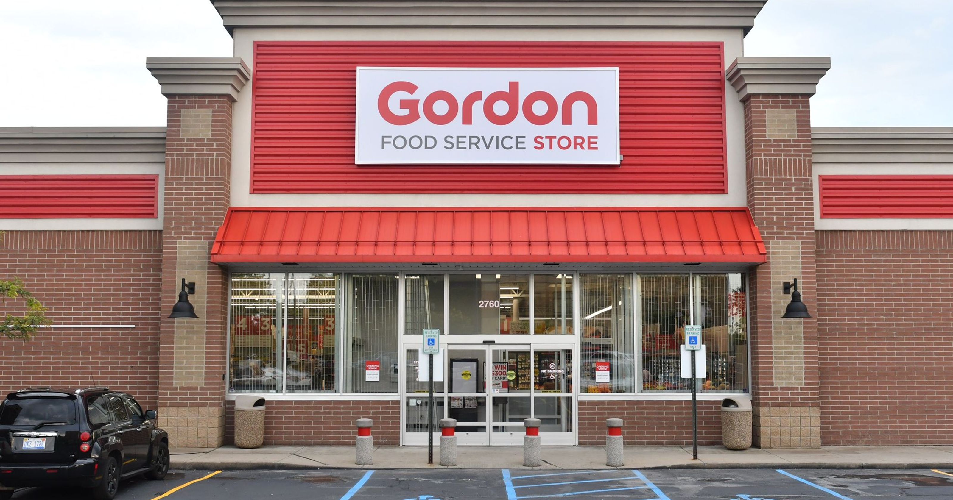 Michigan woman grocery store sign